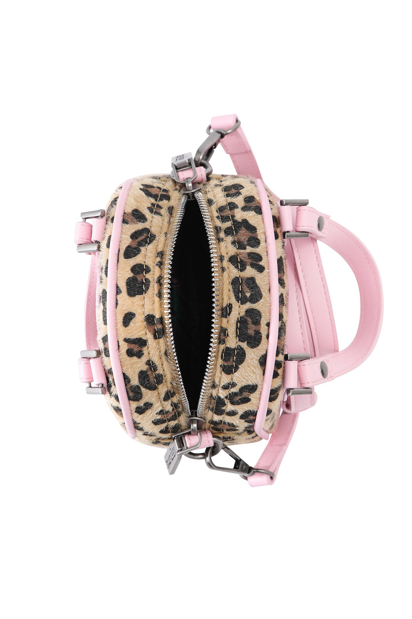 The I.AM.GIA X VON DUTCH MINI BOWLING BAG - LEOPARD features a chic leopard print with light pink handles and straps, a zippered opening, and sleek design—shown against a white background, it's the perfect accessory for any look.