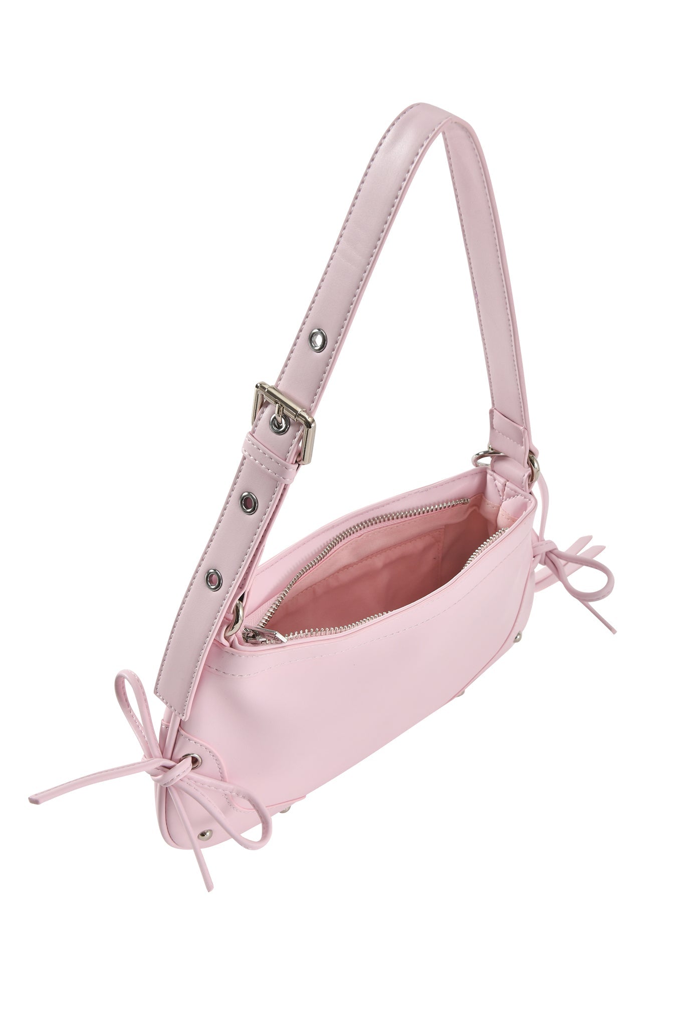 The HAYLEY BAG - BABY PINK by I.AM.GIA is a faux leather shoulder purse with a wide adjustable strap, cute side bows, and a zippered top that opens to reveal the lined interior.