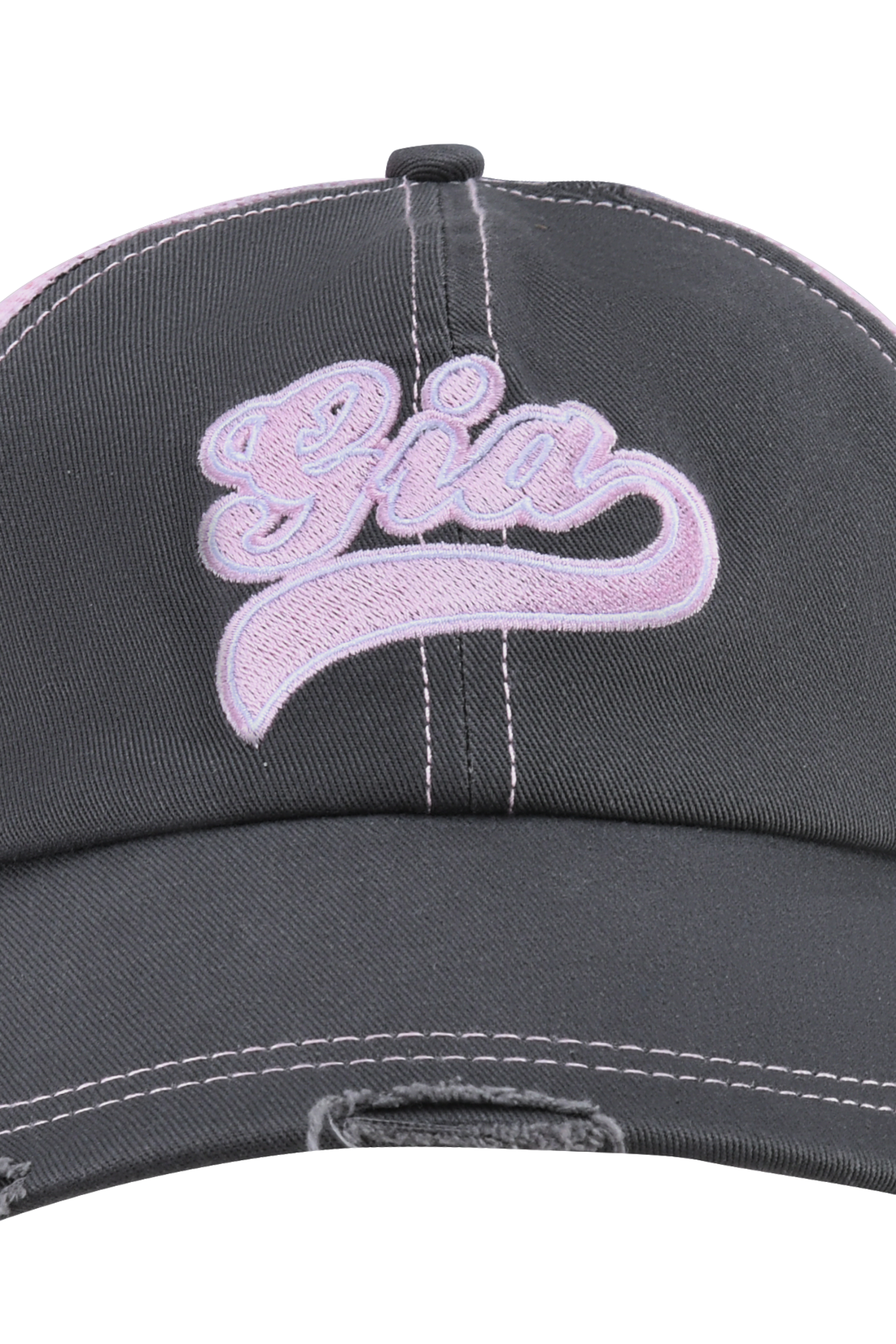 A close-up of the I.AM.GIA SHILOH HAT in grey with baby pink features bold pink script embroidery of the Gia logo on front, white seam and visor stitching, and an adjustable pink snap closure.