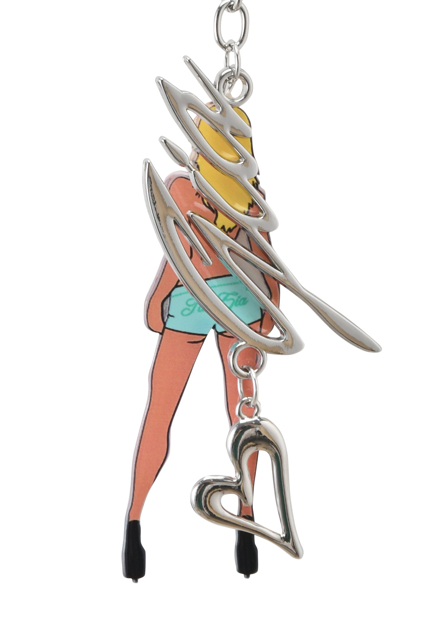 The BLARE KEYCHAIN - BLONDE by I.AM.GIA features a stylized blonde woman, pink skin, black heels, abstract silver metal accents, and a dangling hollow heart charm on custom o-ring hardware.