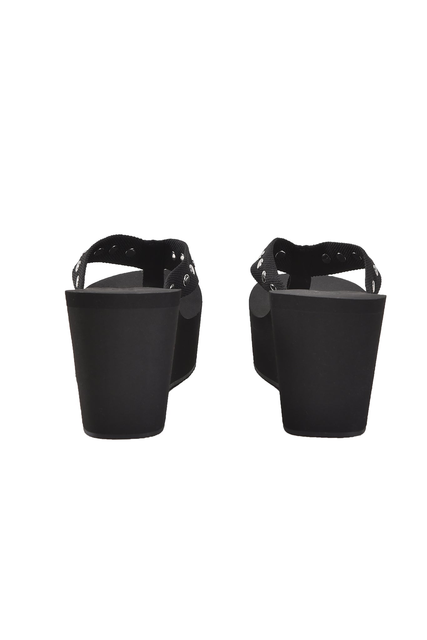 Rear view of the SHELBY STUDDED FLIP FLOP 2.0 in black by I.AM.GIA, featuring ankle straps and chunky high heels, photographed against a white background.