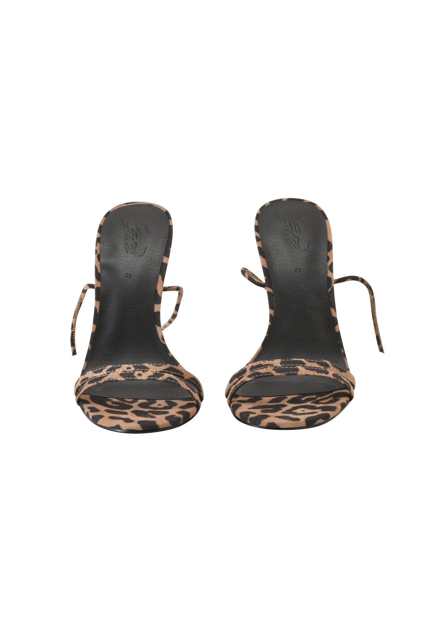 The SCARLETTE HEEL - LEOPARD by I.AM.GIA features open toes, a leopard print, strappy stiletto heel, and thin ankle straps, shown from the front on a white background.