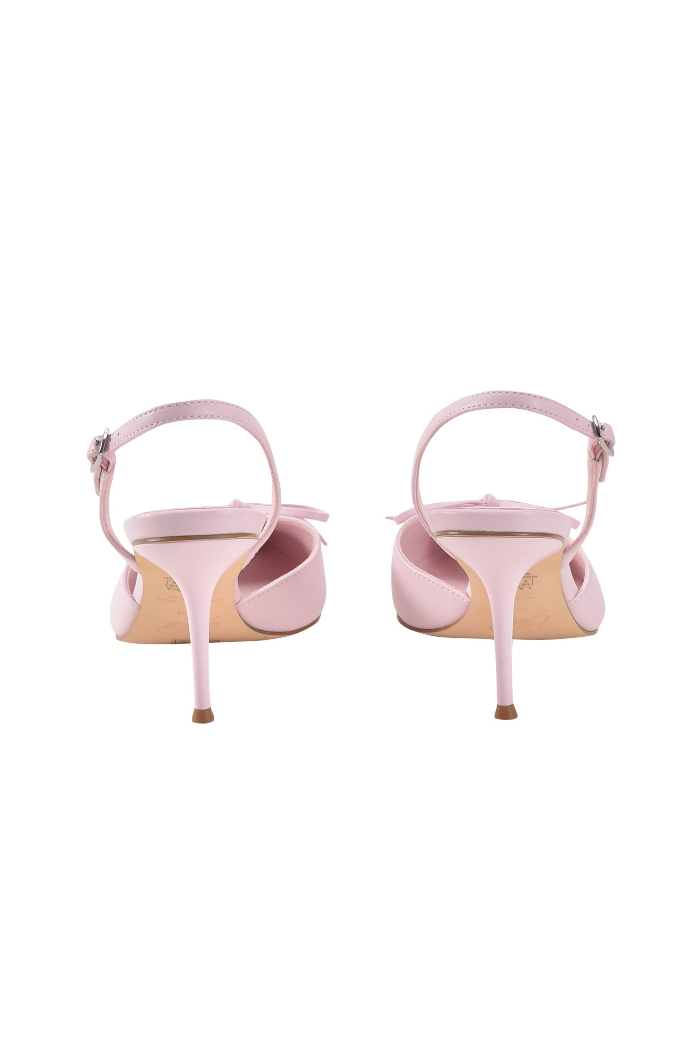 The NOORI MULE by I.AM.GIA in ice pink features kitten heels, ankle straps, and pointed toes in faux leather, displayed from the back on a white background.