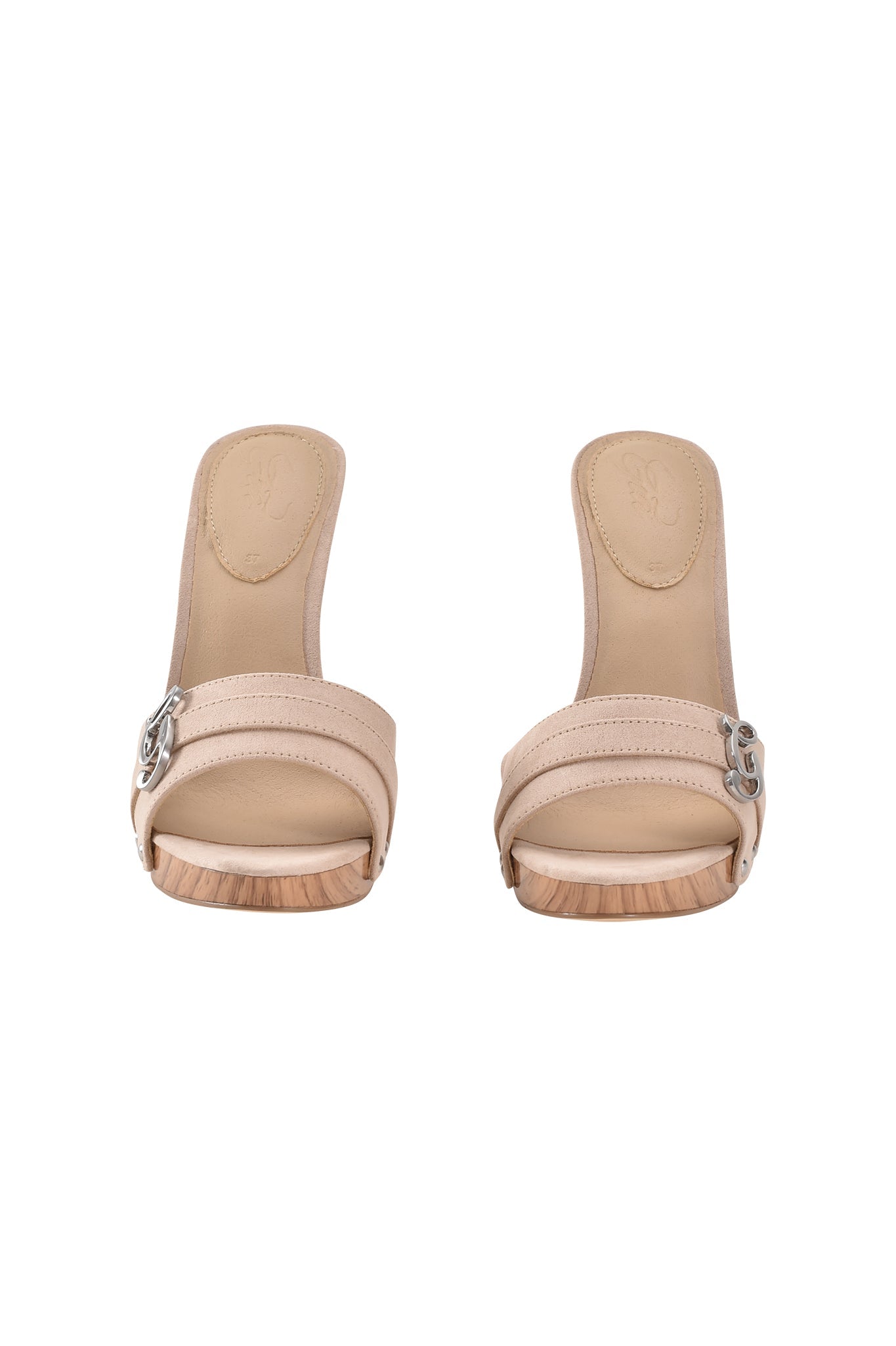 The NICKY HEEL - TAN SUEDE by I.AM.GIA features open toes, wooden soles, and silver buckle accents in tan faux suede, shown from the front on a white background.