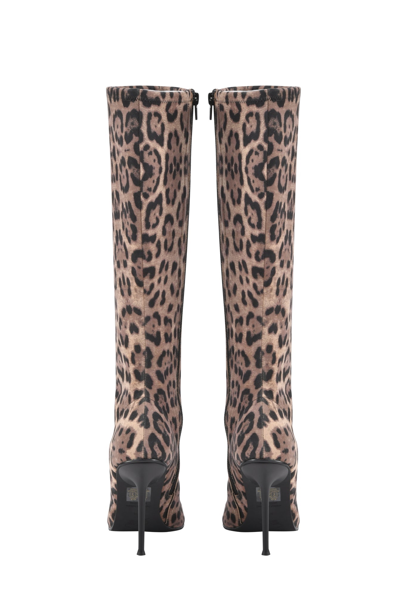 The I.AM.GIA YANA KNEE HIGH BOOTS - PANTHERA feature a bold brown and black panther print, pointed toes, sleek black stilettos, and back zippers for a striking statement look.