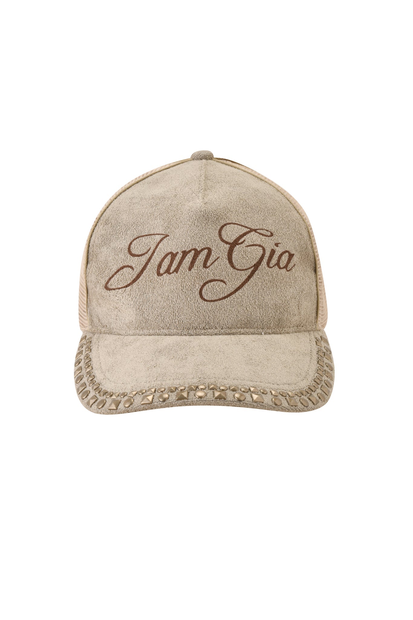 The ISSHA TERRY HAT - STONE by I.AM.GIA is a beige terry hat with "IamGia" embroidered in brown on the front, decorative brim stitching, and a classic snapback trucker design.