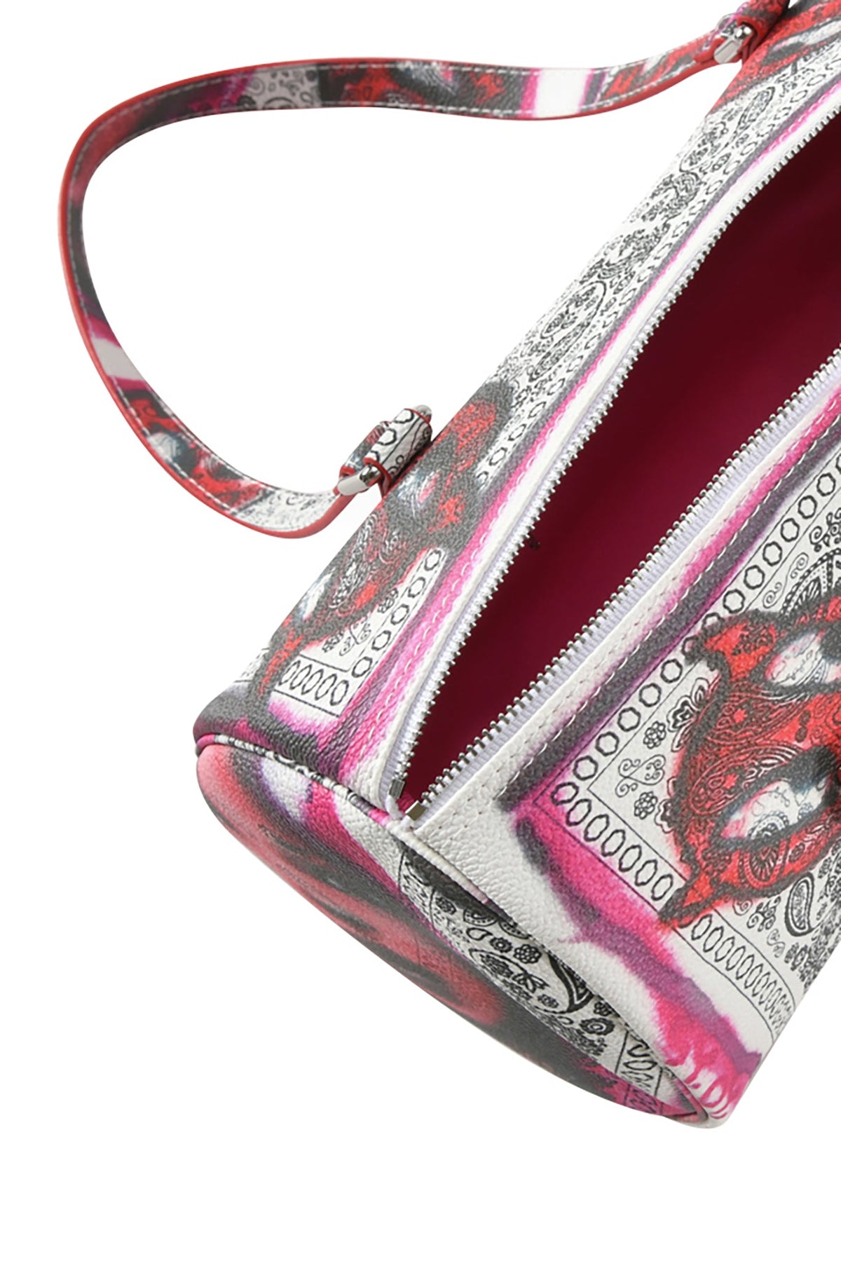 Close-up of the T-REX BARREL BAG - PAISLEY FACE by I.AM.GIA, featuring a pink lining, paisley bandana print, open zipper, detailed stitching, and a soft faux leather strap.
