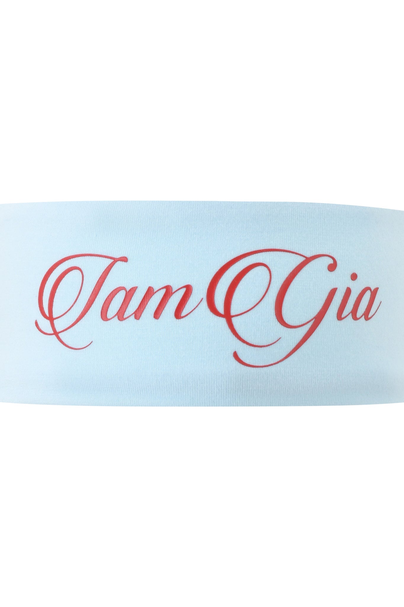 The BLARE SPORT HEADBAND - BABY BLUE by I.AM.GIA features red cursive "I am Gia" lettering on light blue Blare fabric, adding a sporty touch to any outfit.