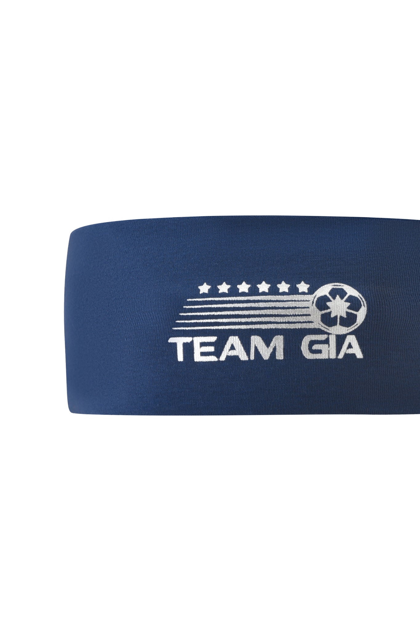 The NOVIA SPORT HEADBAND - NAVY by I.AM.GIA is a blue stretch cotton jersey headband with "TEAM GIA" in white, a soccer ball, five stars, and speed lines printed above the text.