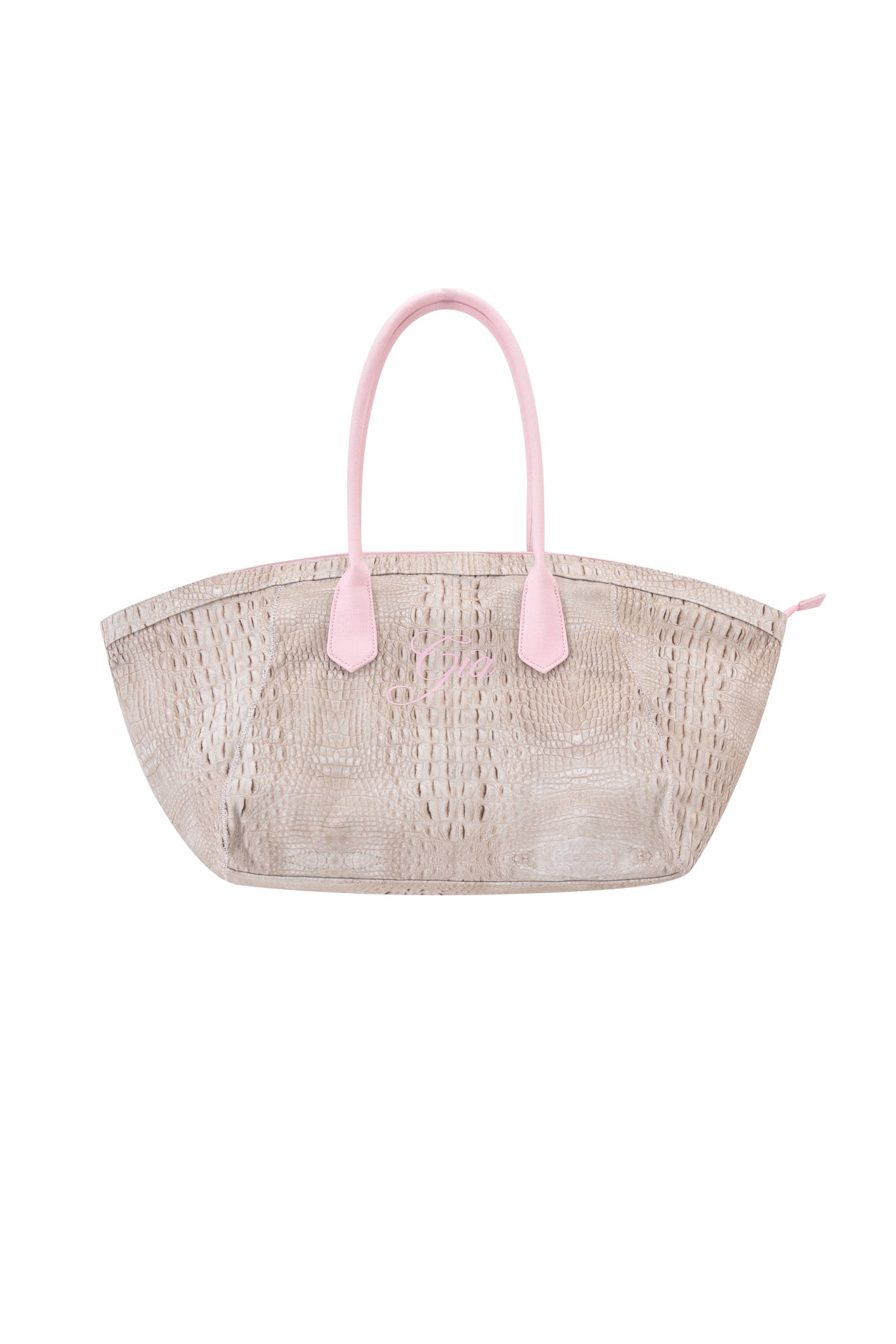 The BLARE TOTE BAG - HOT CROC by I.AM.GIA is a beige textured tote with a wide base, light pink handles and accents, and a subtle crocodile print, displayed on a white background.