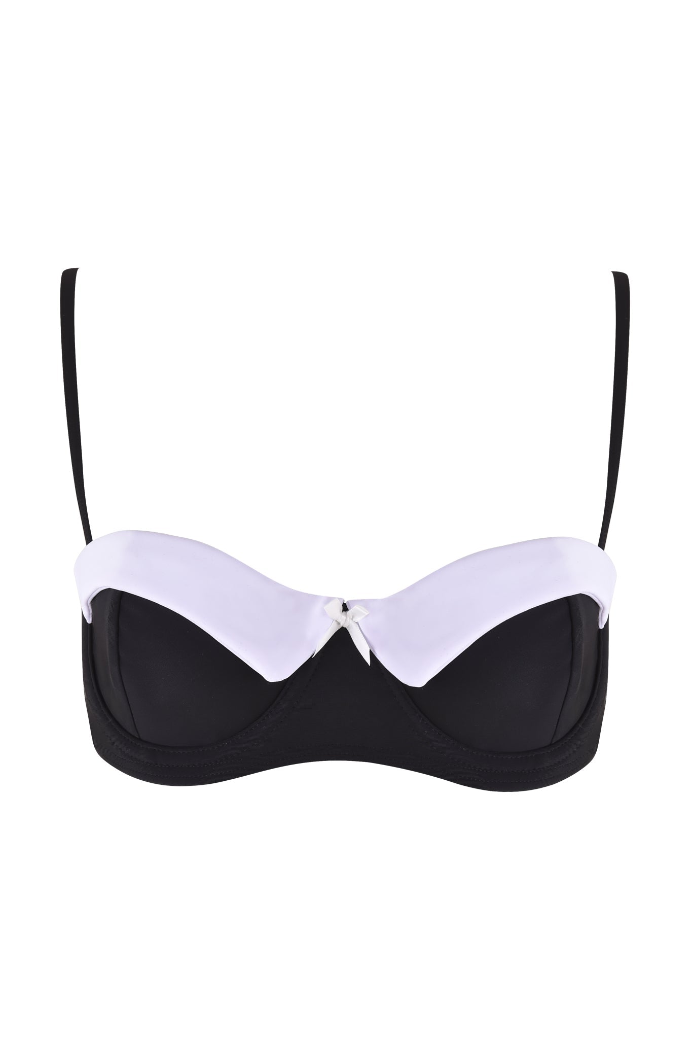 The DION TUXEDO BIKINI TOP - BLACK : WHITE by I.AM.GIA is a black balconette bikini top featuring adjustable straps and a white trim along the top of the cups. Designed with a tuxedo style aesthetic, it includes a small decorative bow at the center where the cups meet.