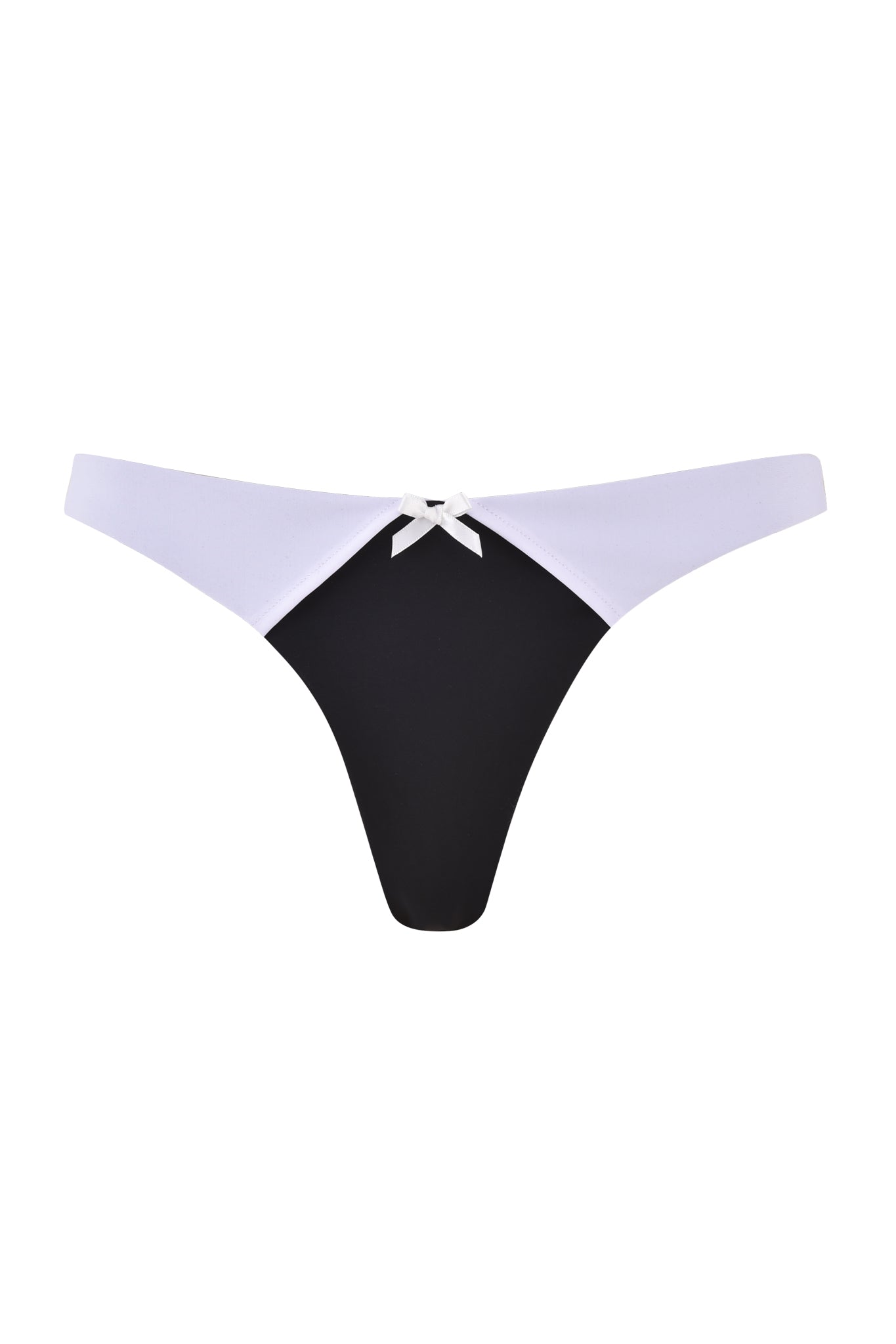 A pair of women’s low-rise waist thong underwear from I.AM.GIA, the DION TUXEDO BIKINI BOTTOM - BLACK : WHITE, features a black front panel with a white waistband. The design is accentuated by a small white bow at the top center of the front panel, adding a subtle nod to tuxedo style bikini bottoms.