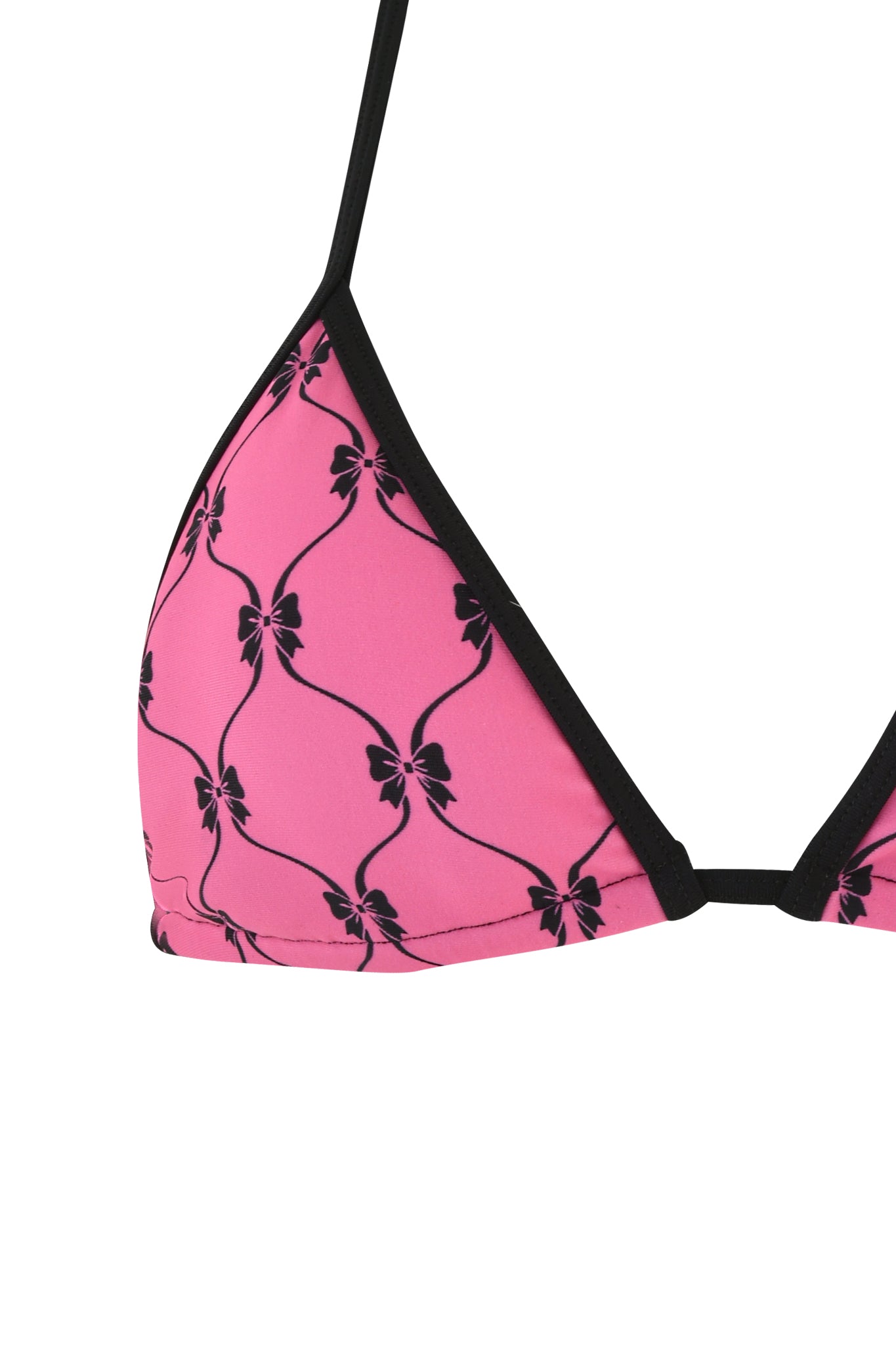 Close-up of the I.AM.GIA MONROE BIKINI TOP - PINK : DIGITAL : GIRLY POP showcasing a pink and black color scheme with an eye-catching pattern of black bows.