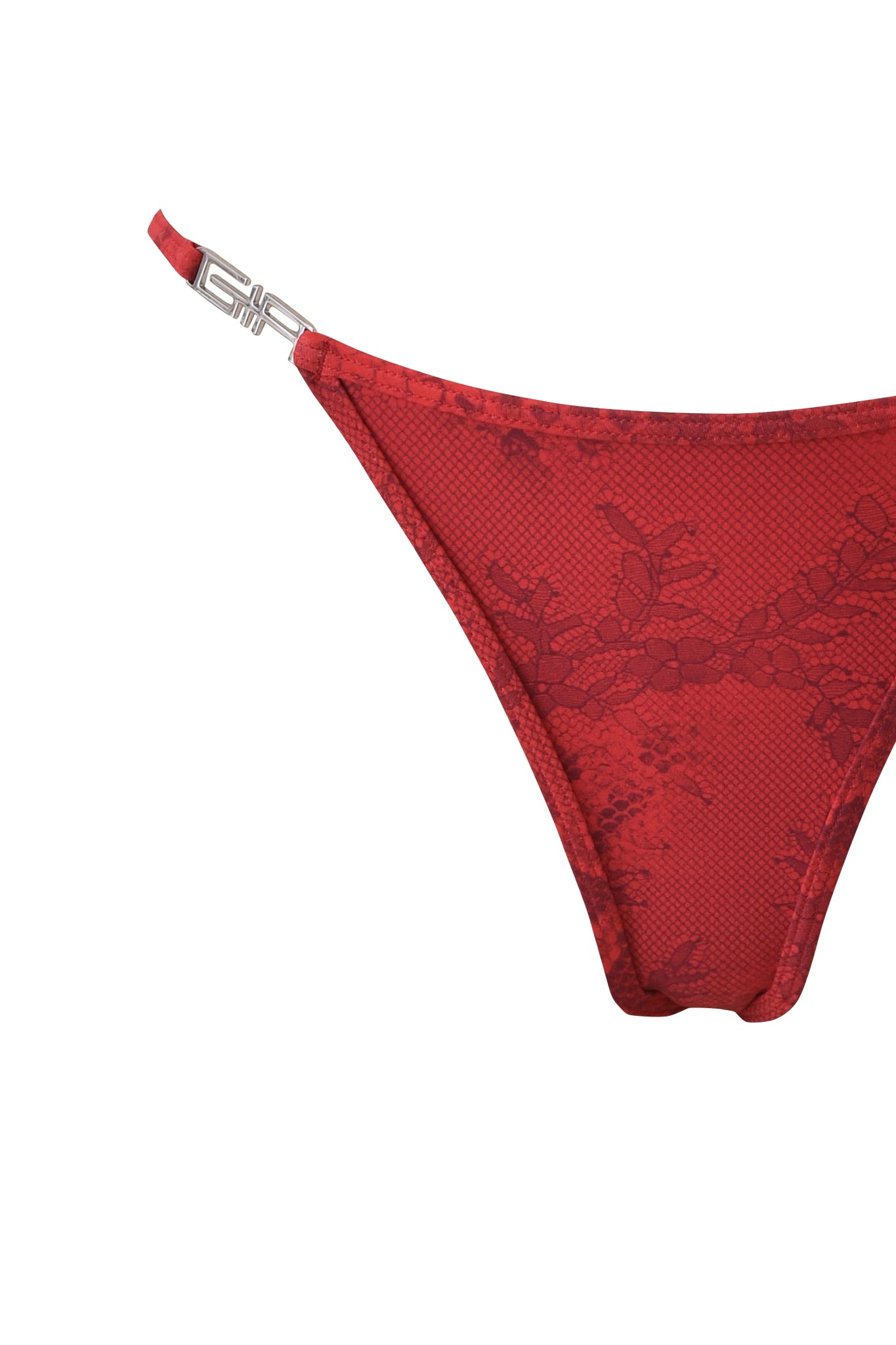 Close-up of the I.AM.GIA AVA BIKINI BOTTOM - RED SERPENTINE, showcasing its signature red serpentine print with a subtle floral lace pattern and a silver clasp accent on the strap, set against a white background.