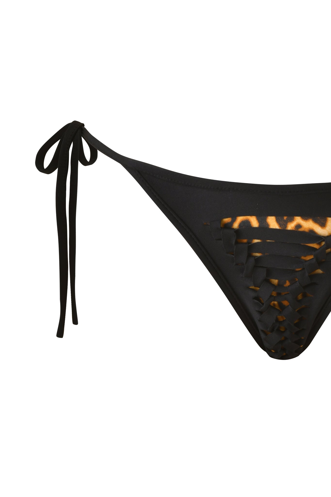 Close-up of the BIJOU BIKINI BOTTOM - BLACK by I.AM.GIA, featuring a black adjustable tie side design with a macrame overlay over brown and yellow GIA print leopard fabric, set against a white background.