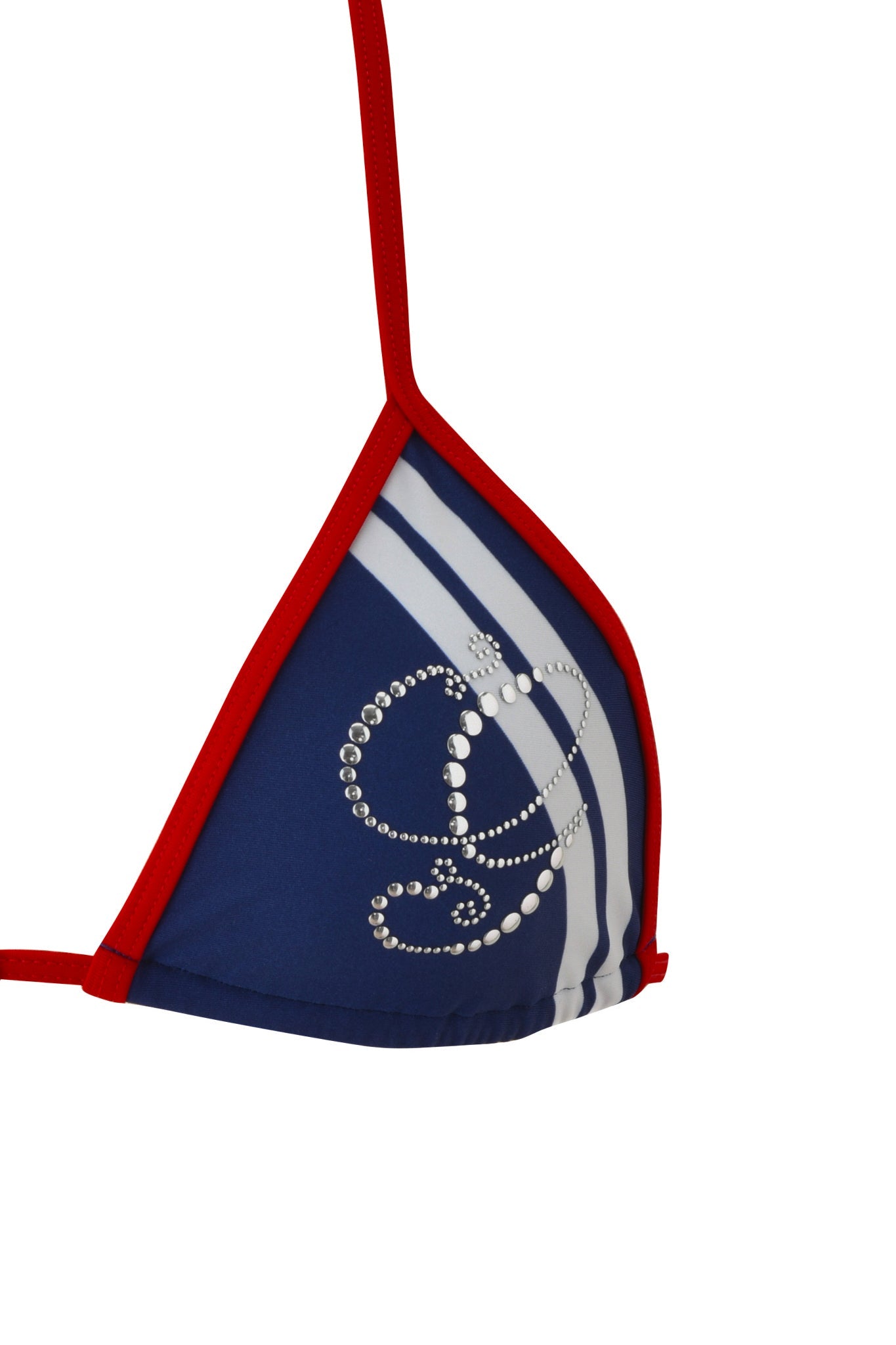 A close-up of the I.AM.GIA CARMELLA BIKINI TOP - NAVY, featuring a blue triangle design with red trim, white diagonal stripes, and rhinestones forming a stylized letter on the adjustable halter neck.