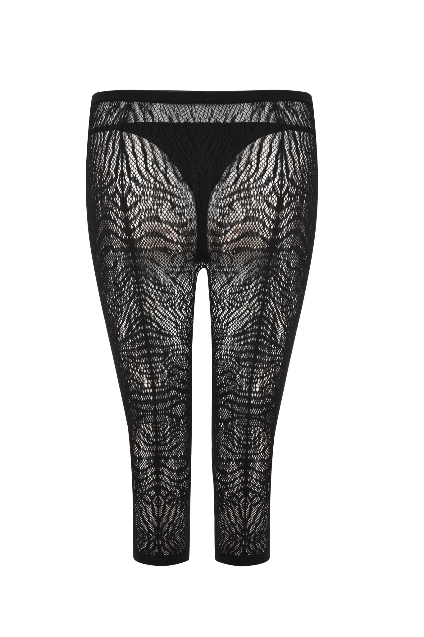 Image of the SYBIL CAPRI - BLACK : ZEBRA from I.AM.GIA, featuring an intricate sheer zebra pattern. The fabric is semi-transparent, revealing the shape of the garment underneath. These bodycon silhouette leggings extend below the knee and have an elastic waistband.