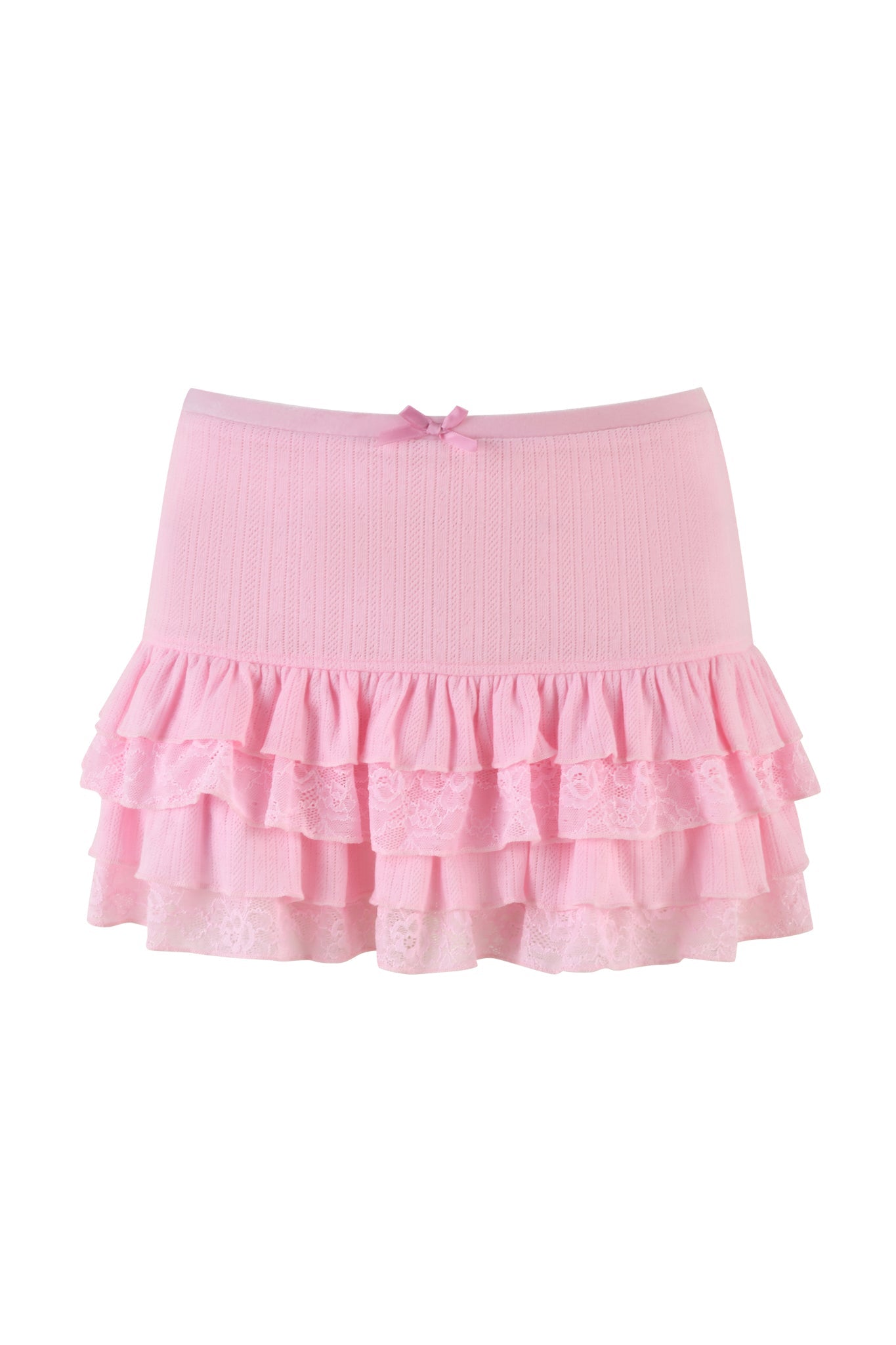 The MIRABELLE SKIRT - PINK : LACE by I.AM.GIA is a delightful mini skirt featuring a fitted waist and a layered ruffled design. The ruffles are adorned with lace accents, and the skirt is finished with a small bow at the waist for an extra cute and feminine touch.