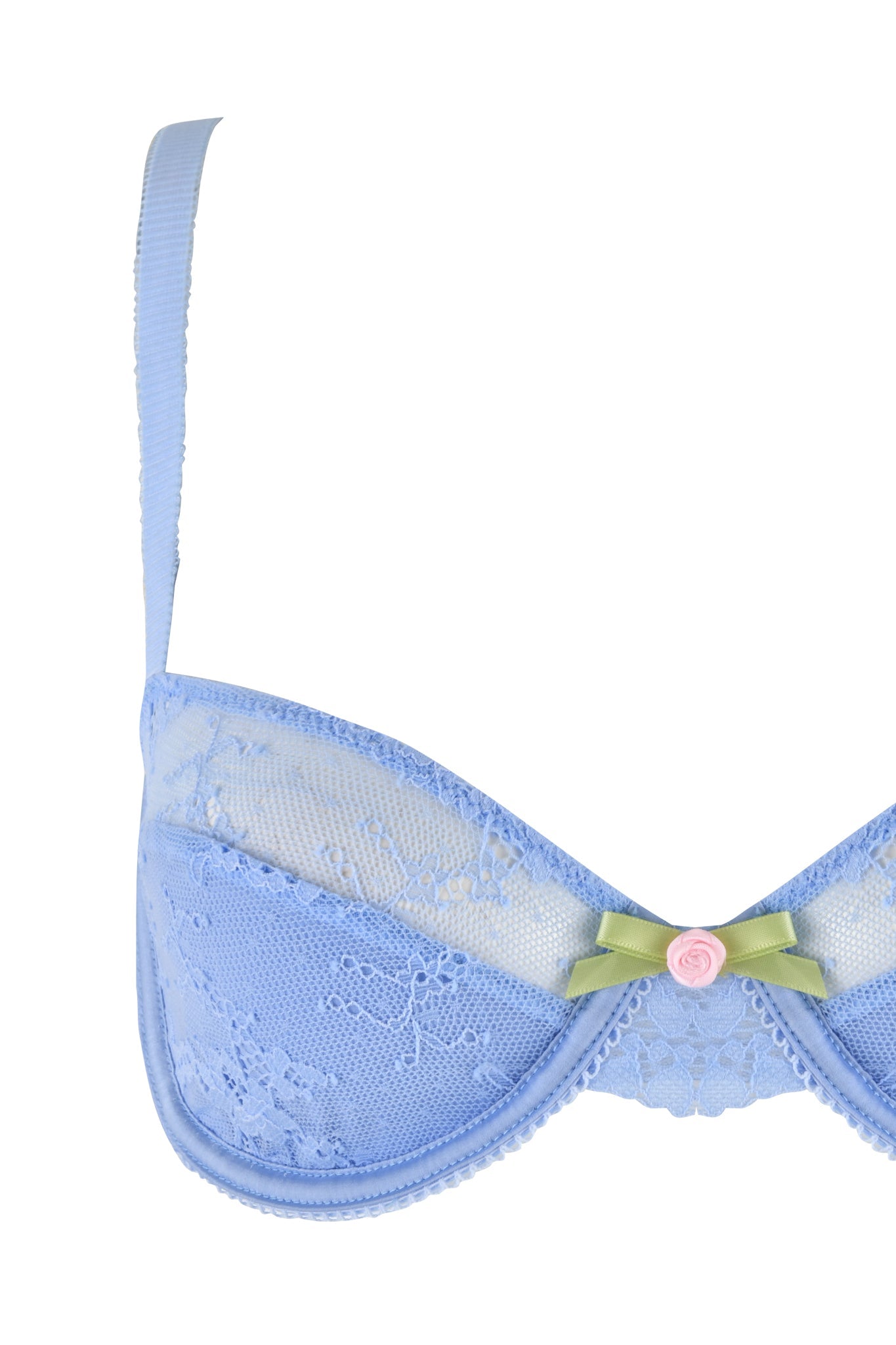 Introducing the CALLISTA SET - BLUE : LACE by I.AM.GIA: This exquisite light blue lace bra features delicate lace trims, a green ribbon, and a pink rose detail at the center. With adjustable straps for a perfect fit, its exquisite pattern and decorative elements are showcased beautifully in the front half view of the bra against a plain white background.