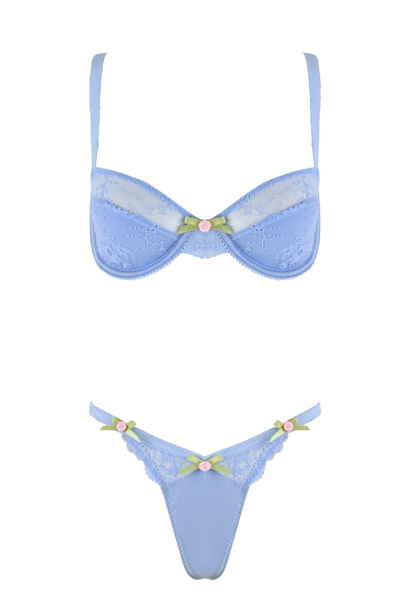 The CALLISTA SET - BLUE : LACE by I.AM.GIA is a light blue lingerie set that features a lace balconette bra accented with green ribbons and pink bows, paired with matching thong panties adorned with lace trims. The design is delicate and feminine, boasting exquisite floral lace patterns.