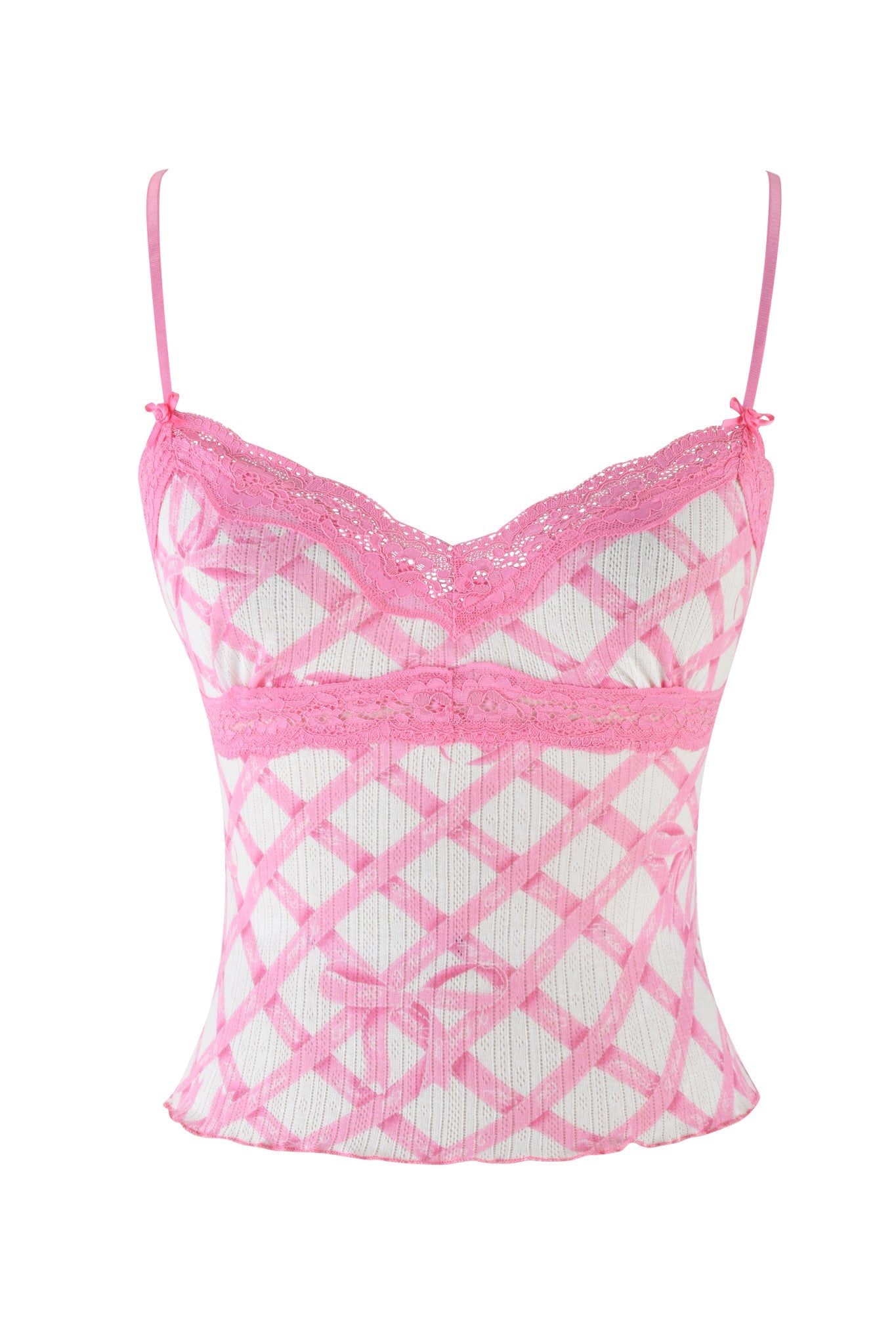 The Cassia top by I.AM.GIA is a pink and white plaid camisole featuring pointelle knit, lace trim, and spaghetti straps. The crisscross pattern with varying shades of pink is complemented by delicate lace on the neckline and underbust for a feminine touch.