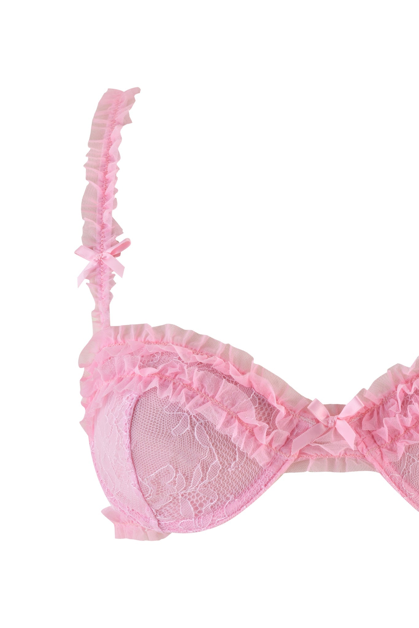 Discover the MADISON 3 PIECE SET - PINK by I.AM.GIA, which includes a lace bra with charming ruffled straps and cup edges in delicate floral patterns. The design is enhanced with small decorative bows. Complete your ensemble with the matching lace thong for a cohesive look.