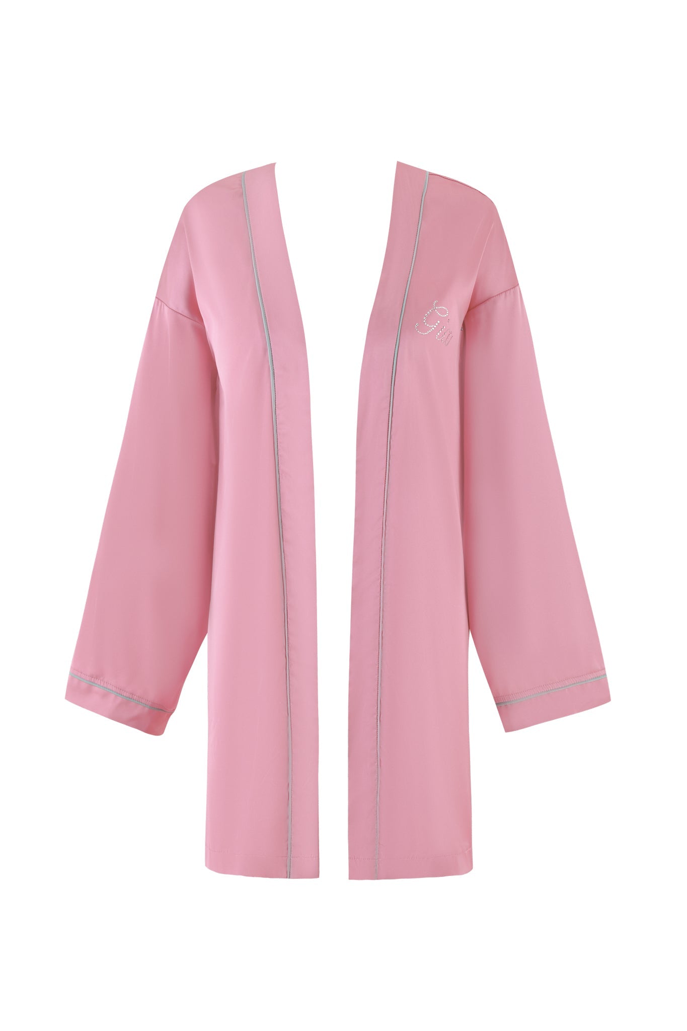 The MARTINA SLEEP ROBE - PINK by I.AM.GIA is crafted from silky satin and offers a relaxed fit. This chic pink robe features long sleeves, an open front with light gray piping, and an elegant embroidered design on the left chest area.