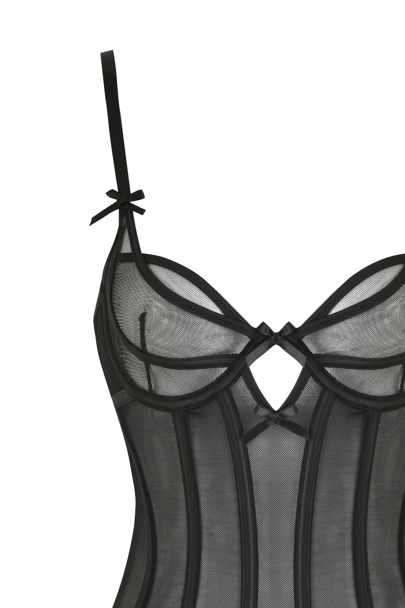 The JACQUELINE BODYSUIT - BLACK by I.AM.GIA is a striking piece, showcasing underwire cups and corset boning with hook details along the seams. This vintage vixen design is elegantly finished with small bows on the straps and intricate cross patterns at the front.