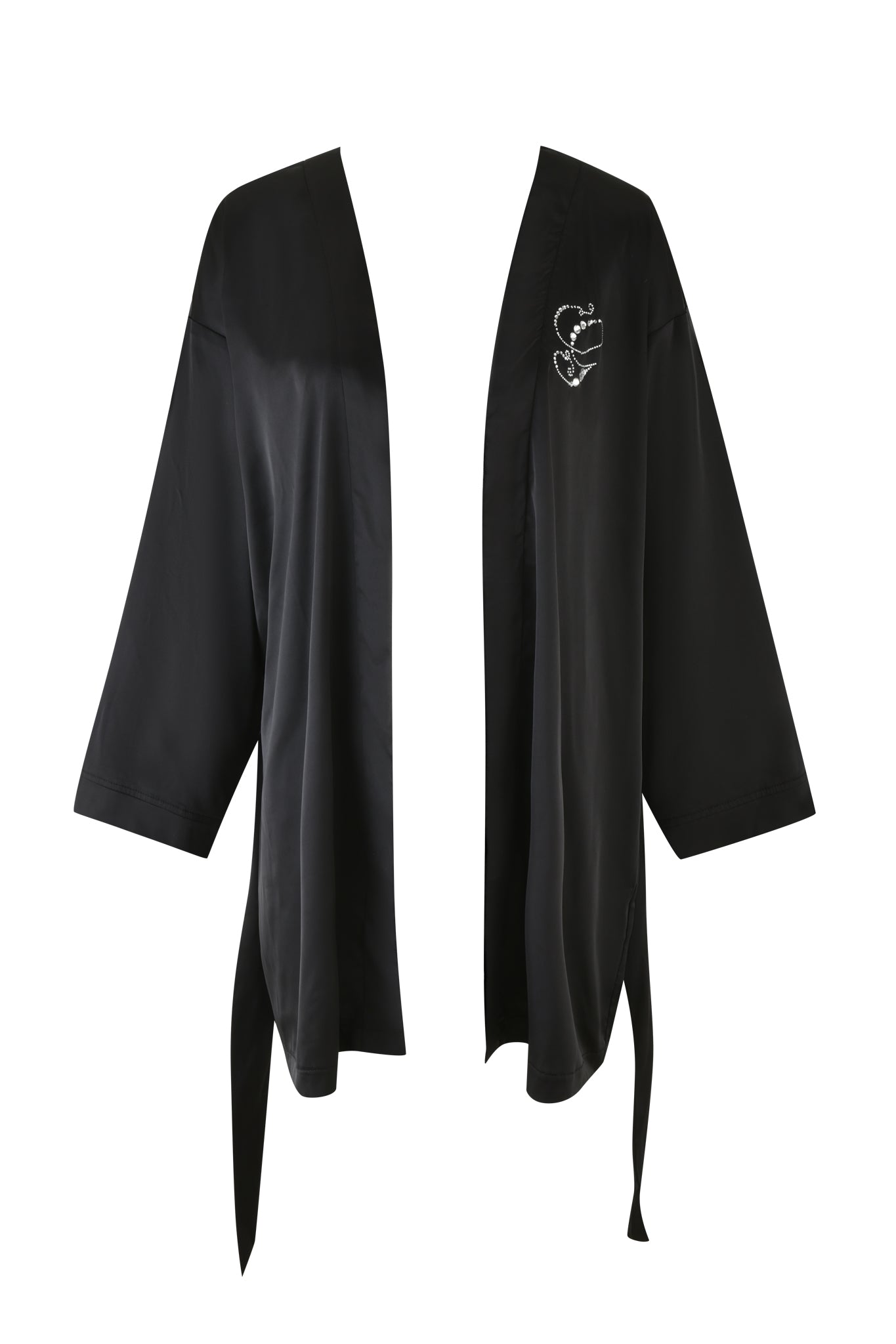 The LARSA 2.0 SLEEP ROBE - BLACK by I.AM.GIA is a black silk kimono-style robe featuring wide sleeves and a waist tie. It boasts a stunning embroidered snake design on the left chest and is crafted from luxurious satin, offering a smooth, shiny finish.