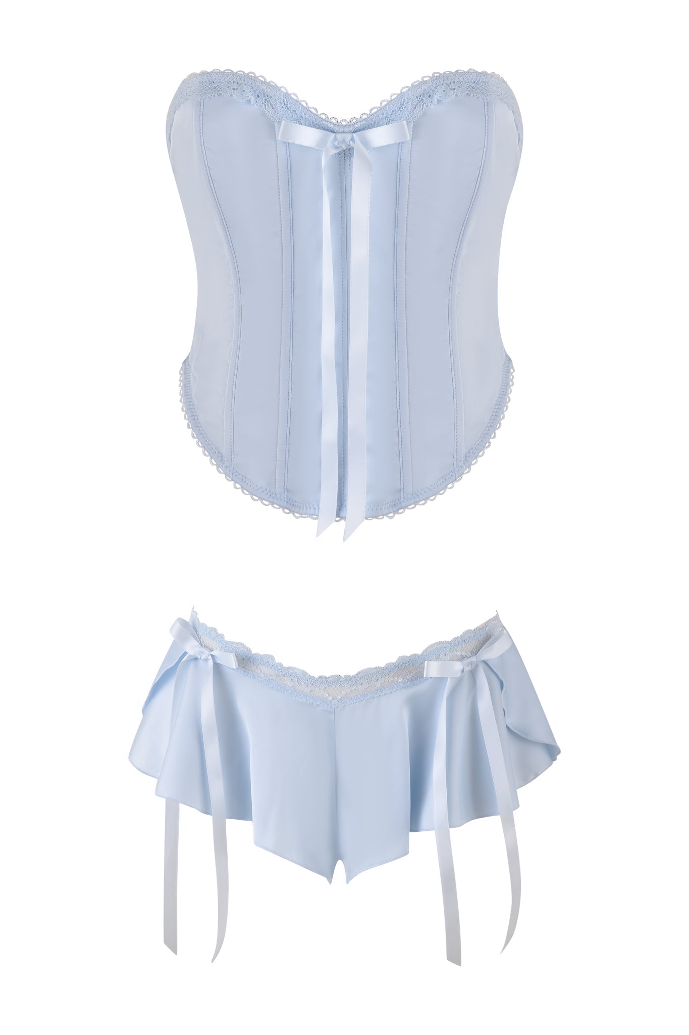 The BRIDGET BUSTIER SHORT SET in blue by I.AM.GIA features a vintage-inspired light blue bustier adorned with stretch lace trim and bow detail, paired with a matching skirt boasting ribbon accents, all displayed on a white background.