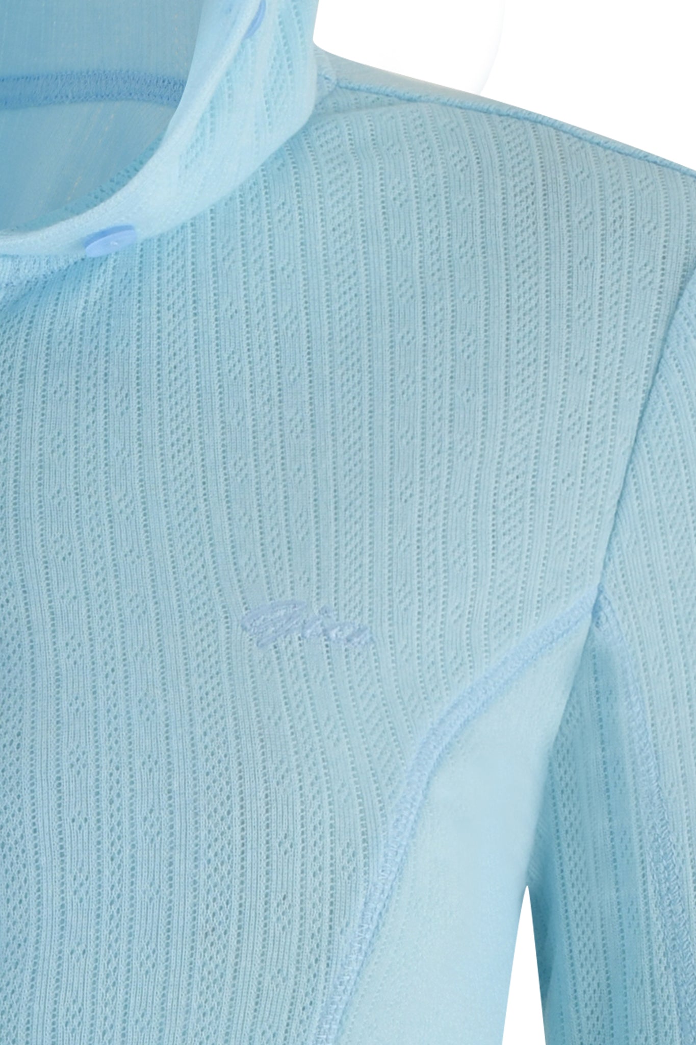 Close-up of the baby blue MIA HOODIE 2.0 by I.AM.GIA, showcasing a textured knit with detailed vertical patterns and a subtle chest embroidery. This pointelle knit piece offers a soft and lightweight feel.