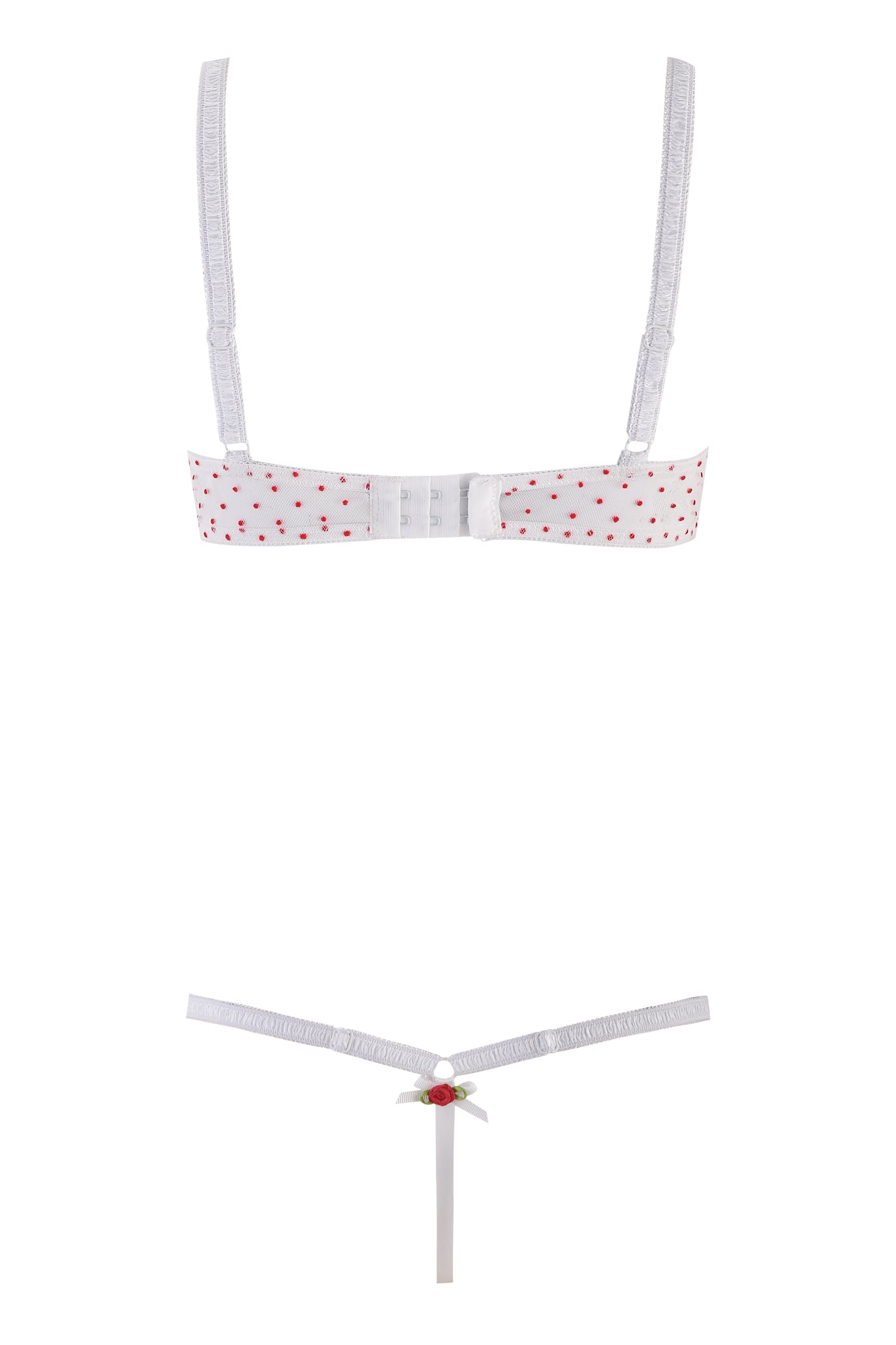 The CHRISSY SET - WHITE by I.AM.GIA features a white cotton bra with red polka dots and adjustable straps, paired with a thong that has thin straps and a small red and green detail at the waistband, shown from the back.