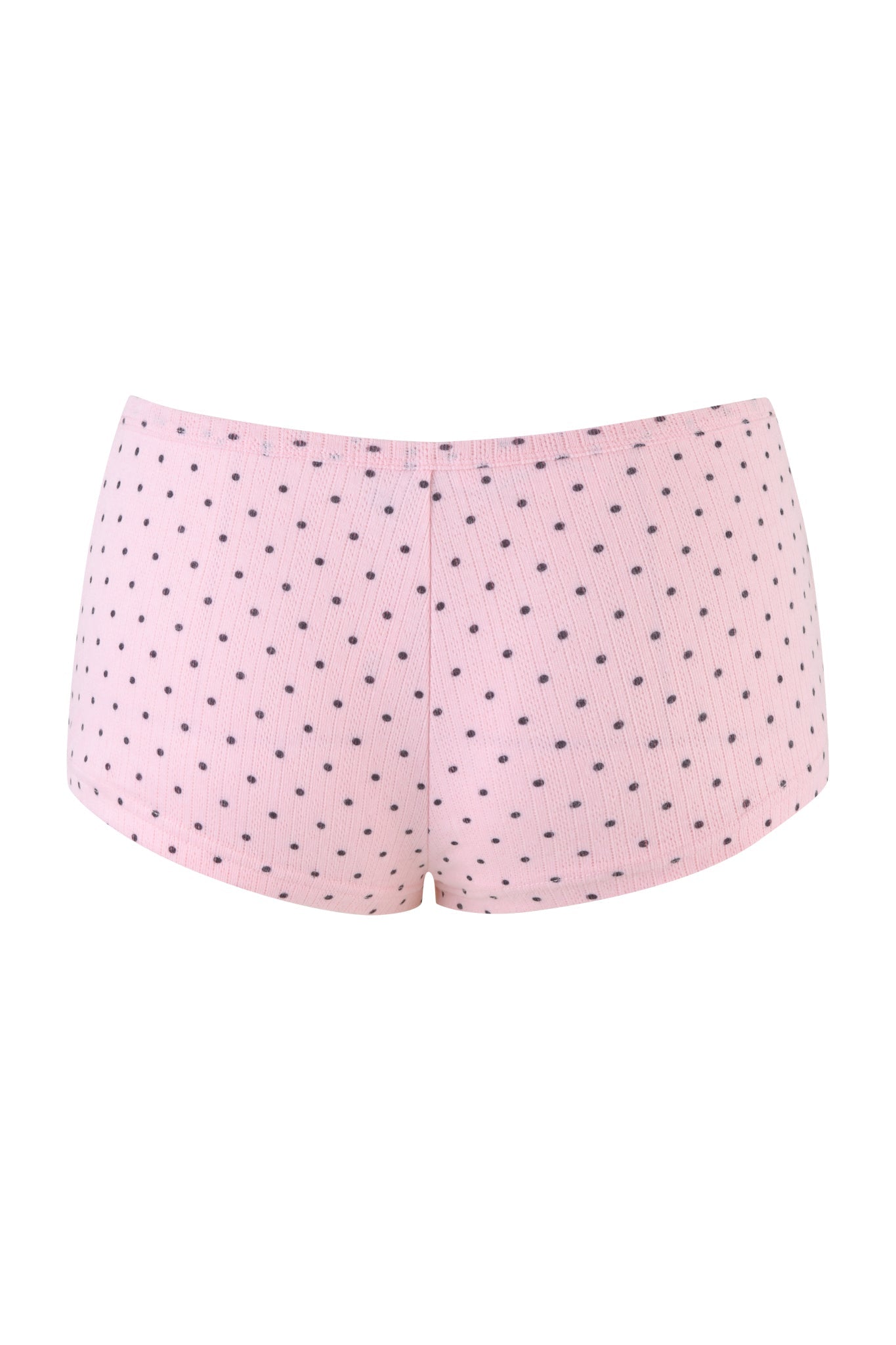 The LAUREL SHORT - LIGHT PINK by I.AM.GIA is a low rise women’s underwear with a ribbed texture and small black polka dots, shown from the back.