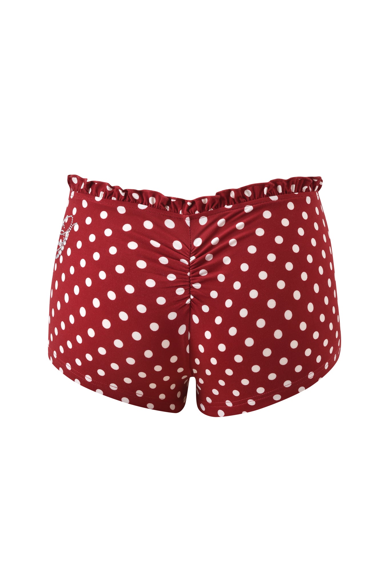 The MELANIE SHORT - RED POLKA DOT by I.AM.GIA features a ruffled waistband and ruched center back seam, creating a playful bodycon fit. Shown from the rear view, these micro mini shorts are perfect for a bold look.
