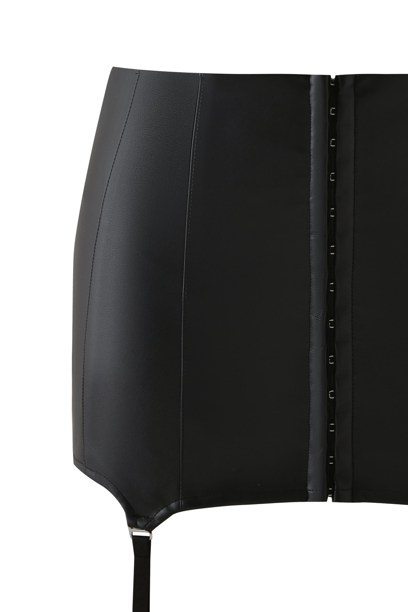 Close-up of the SIBARI MINI SKIRT - BLACK by I.AM.GIA featuring faux leather, vertical seams, front hook-and-eye closure, and a garter strap for a bold garter style look.