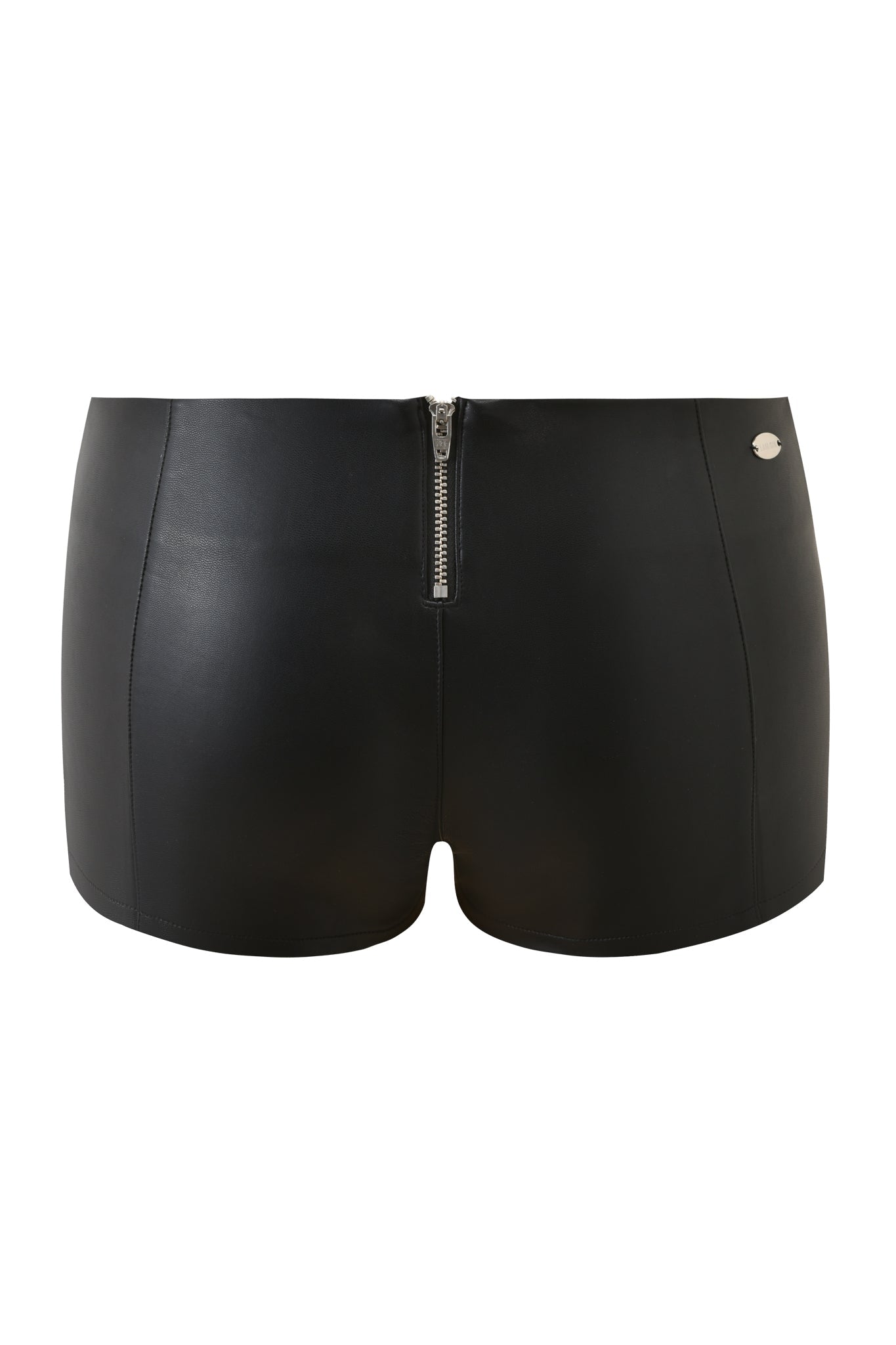 The TEMPEST HOT SHORT - BLACK by I.AM.GIA is a high-waisted black PU short with a front zipper and a small round metallic logo on the right hip, shown against a white background.