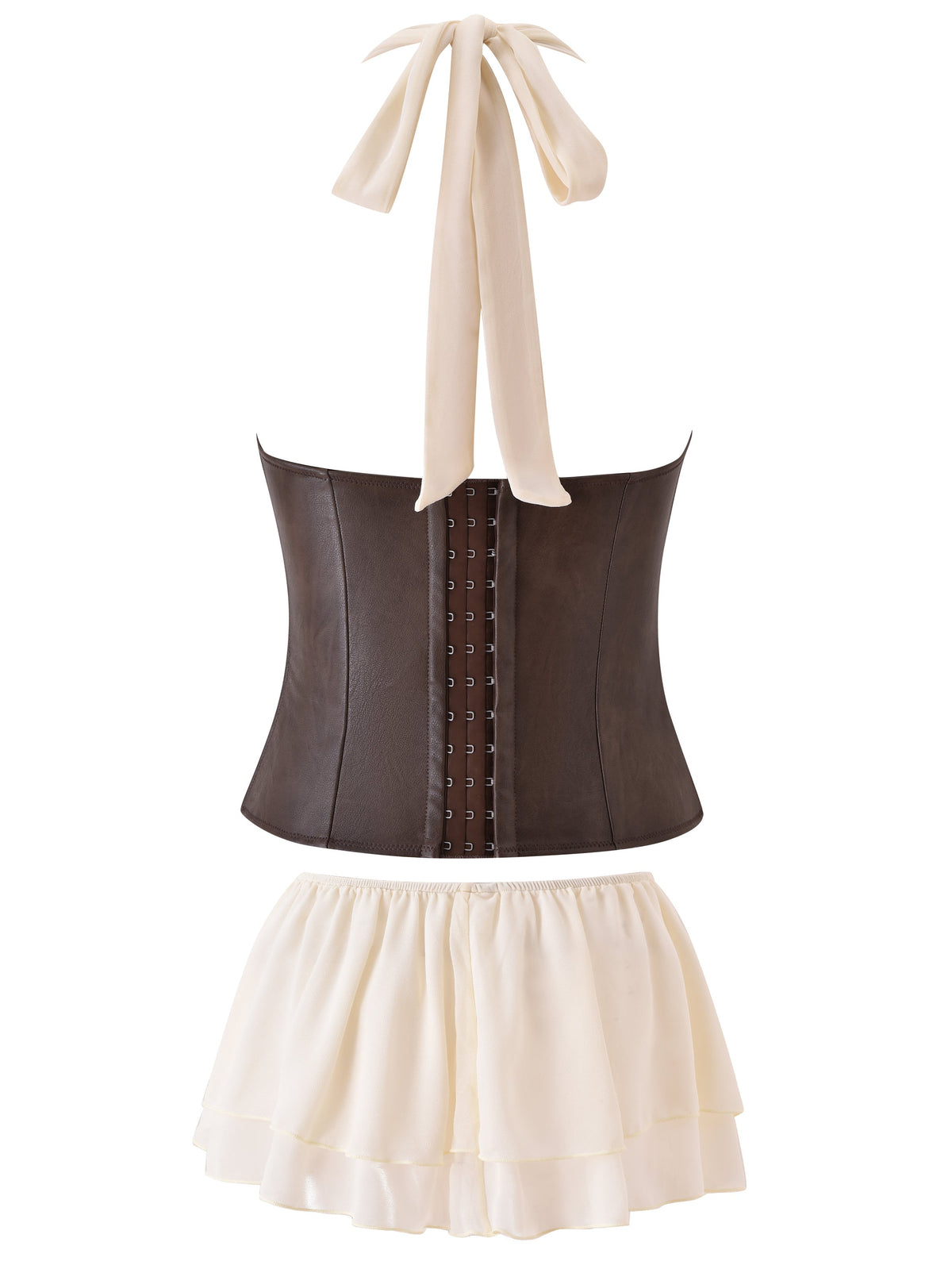 The OCEANA CORSET SET - BROWN by I.AM.GIA features a brown faux leather halter corset with a cream bow and vintage-washed bustier detailing, paired with a flouncy, layered cream mini skirt, all showcased against a white background.