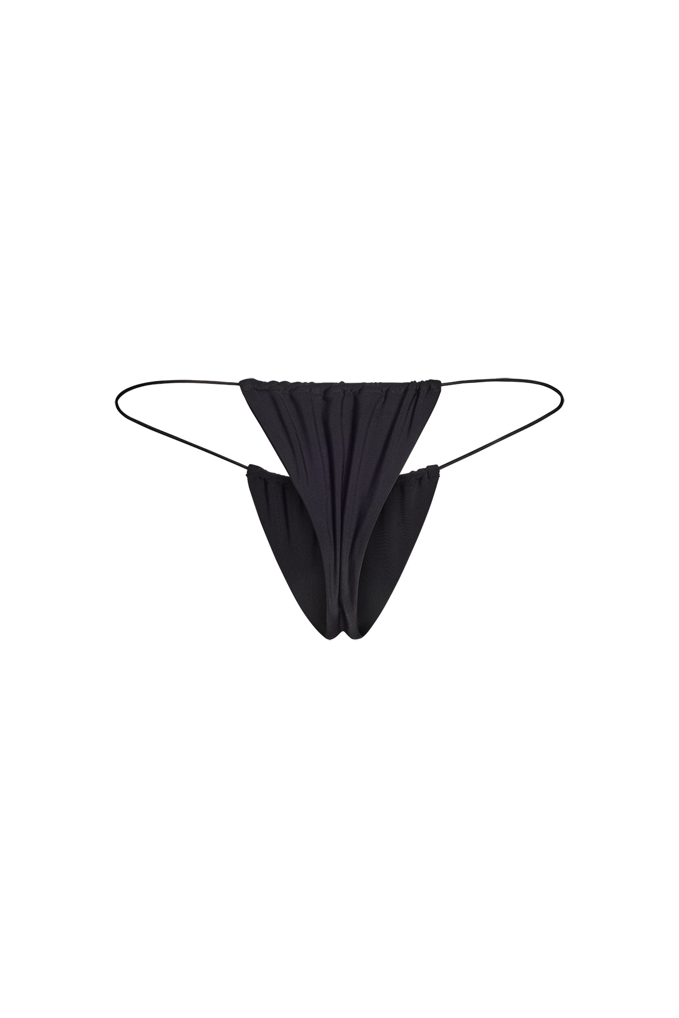 The BAMBI BIKINI BOTTOM - BLACK by I.AM.GIA features a minimalistic design with a narrow front panel and thin elastic side straps, creating a sleek and simple appearance. The material is smooth and stretchy, ensuring comfort and a close fit.