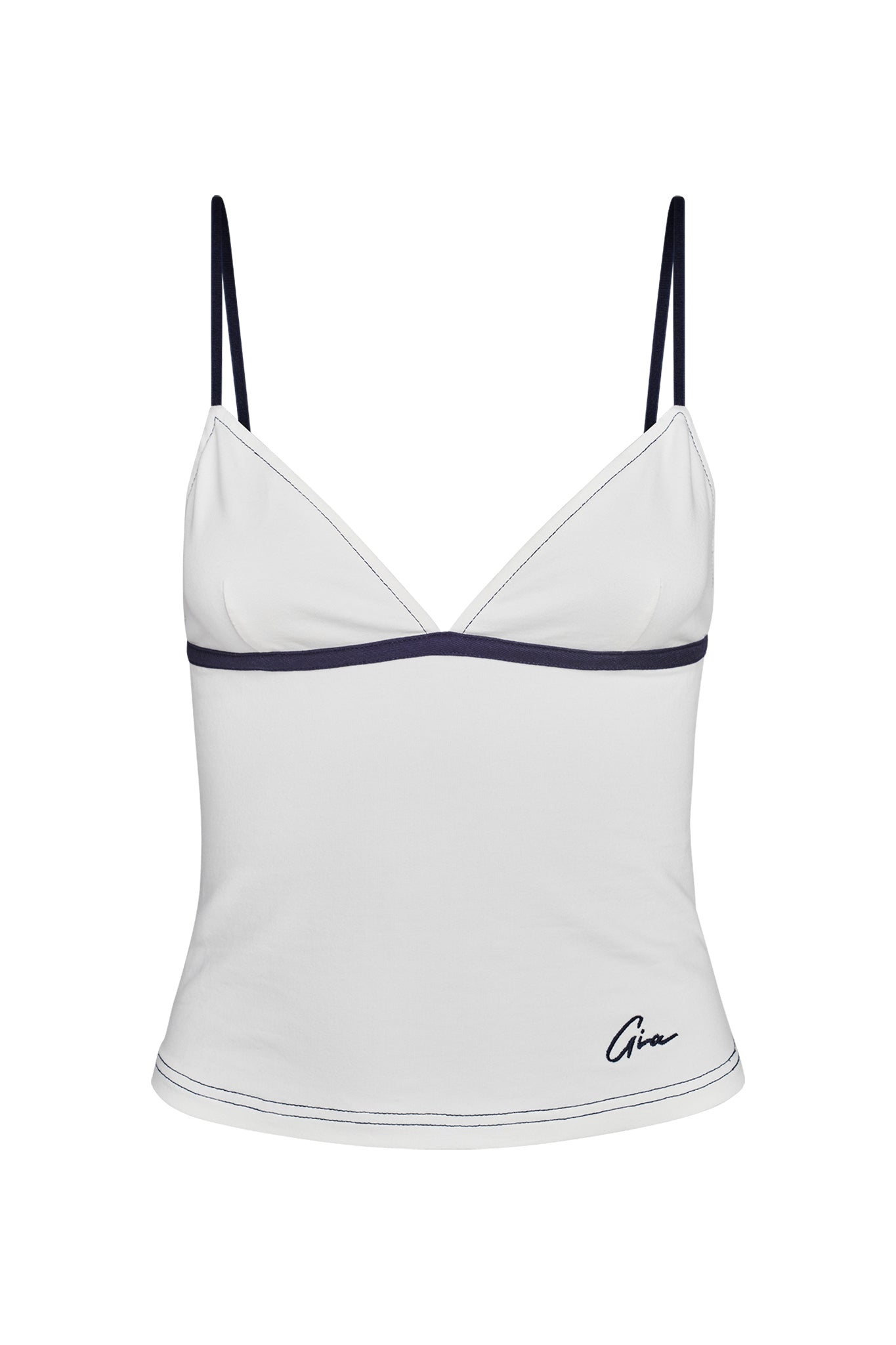 The EDITA TOP - WHITE by I.AM.GIA is a white sleeveless camisole featuring thin black straps and black trim along the neckline and underbust. The hem is detailed with black stitching, and there’s a small cursive I.AM.GIA inscription in black at the bottom right corner.