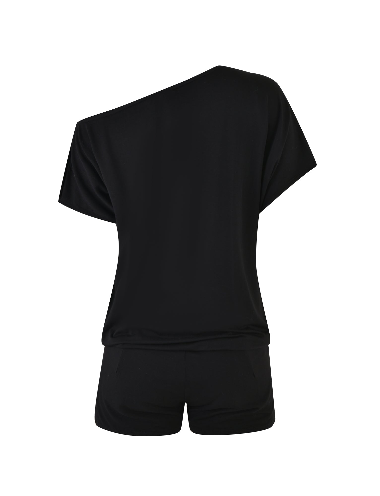 A black romper with an asymmetrical neckline and short sleeves from I.AM.GIA, the EZIA ROMPER - BLACK. The soft and comfortable fabric makes it suitable for casual wear. The shorts have a relaxed fit, and the ensemble is showcased from the back.