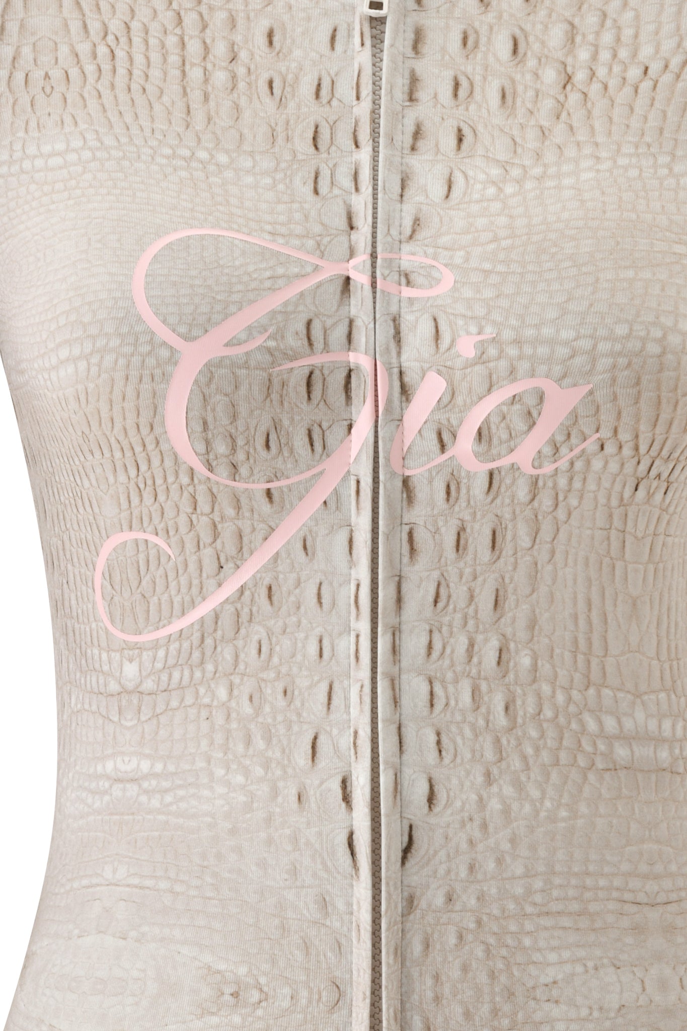A close-up of the BLARE HOODIE - HOT CROC by I.AM.GIA, featuring a beige faux-crocodile textured surface with a prominent center seam and “Gia” written in pink script across it.