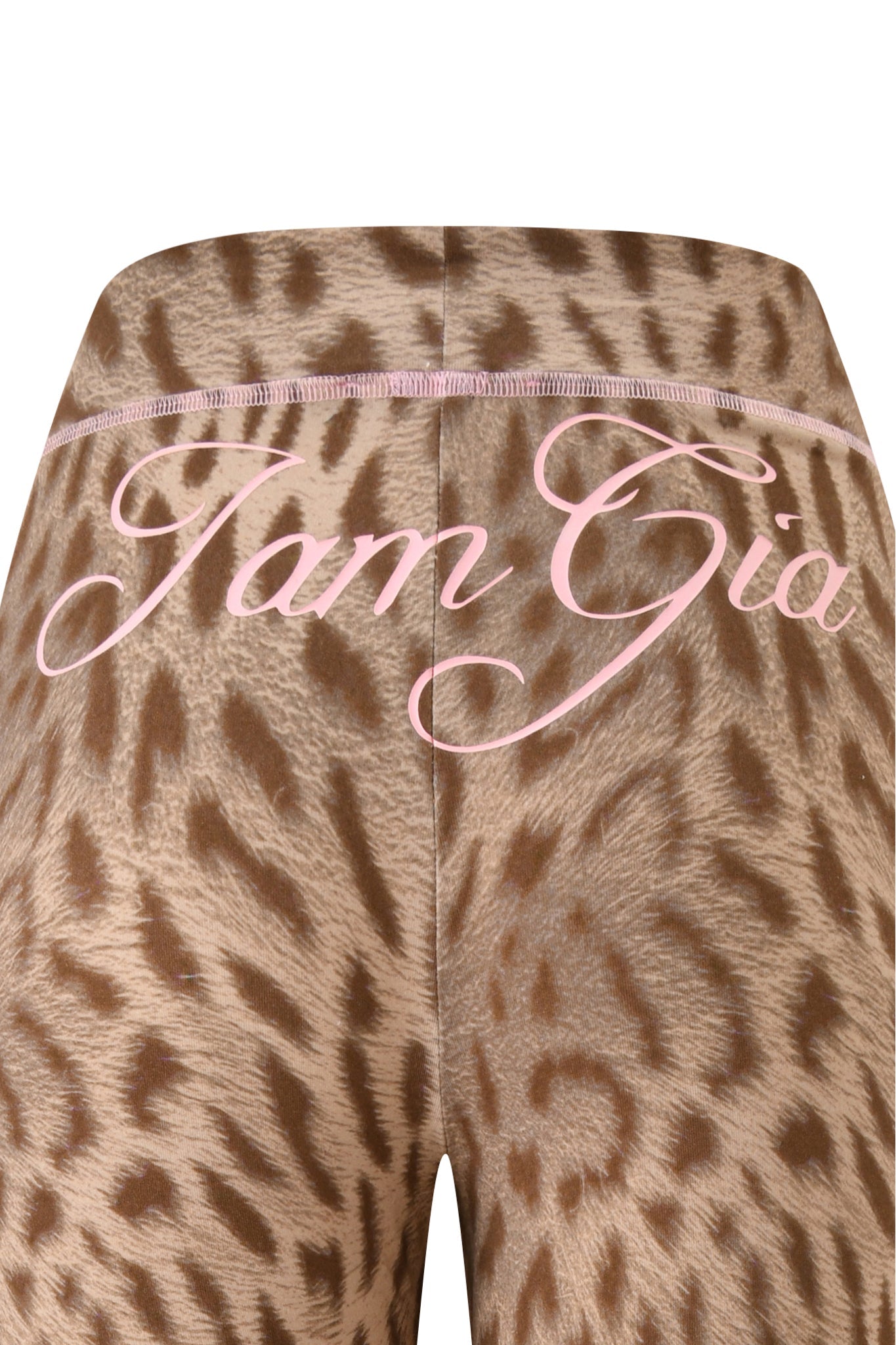 Close-up of the BLARE TRACKPANT - BLAZE CHEETAH by I.AM.GIA, featuring a bold cheetah print and "I.AM.GIA" in large pink cursive across the waistband.