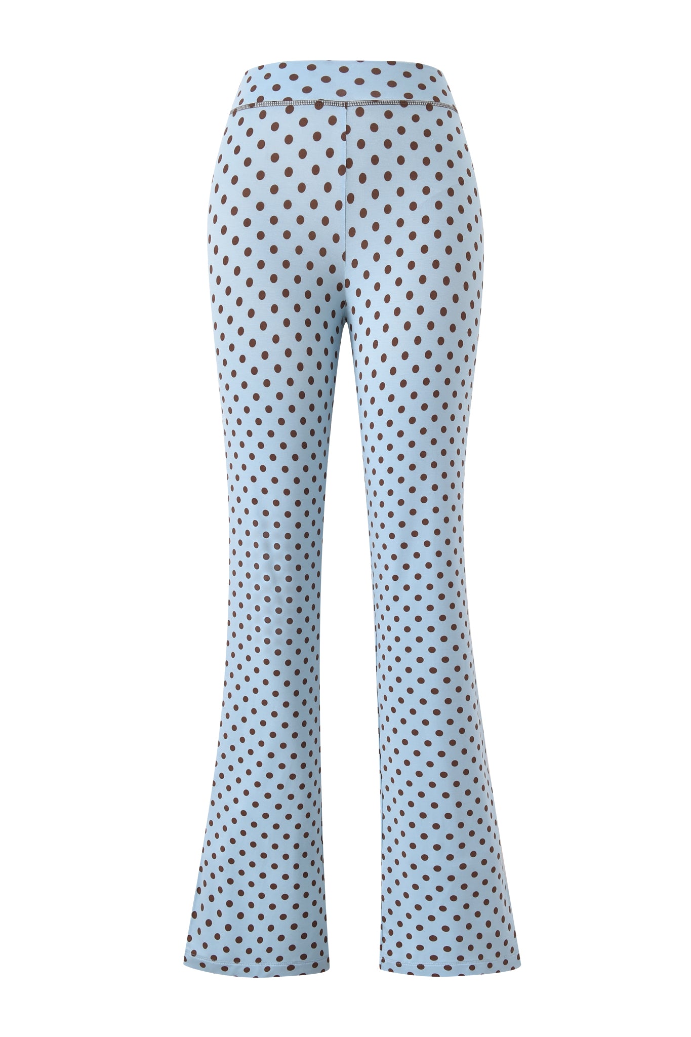 The BLARE TRACKPANT - BLUE POLKA DOT by I.AM.GIA is a light blue, high-waisted flared pant with evenly spaced black polka dots, shown from the back on a plain white background.
