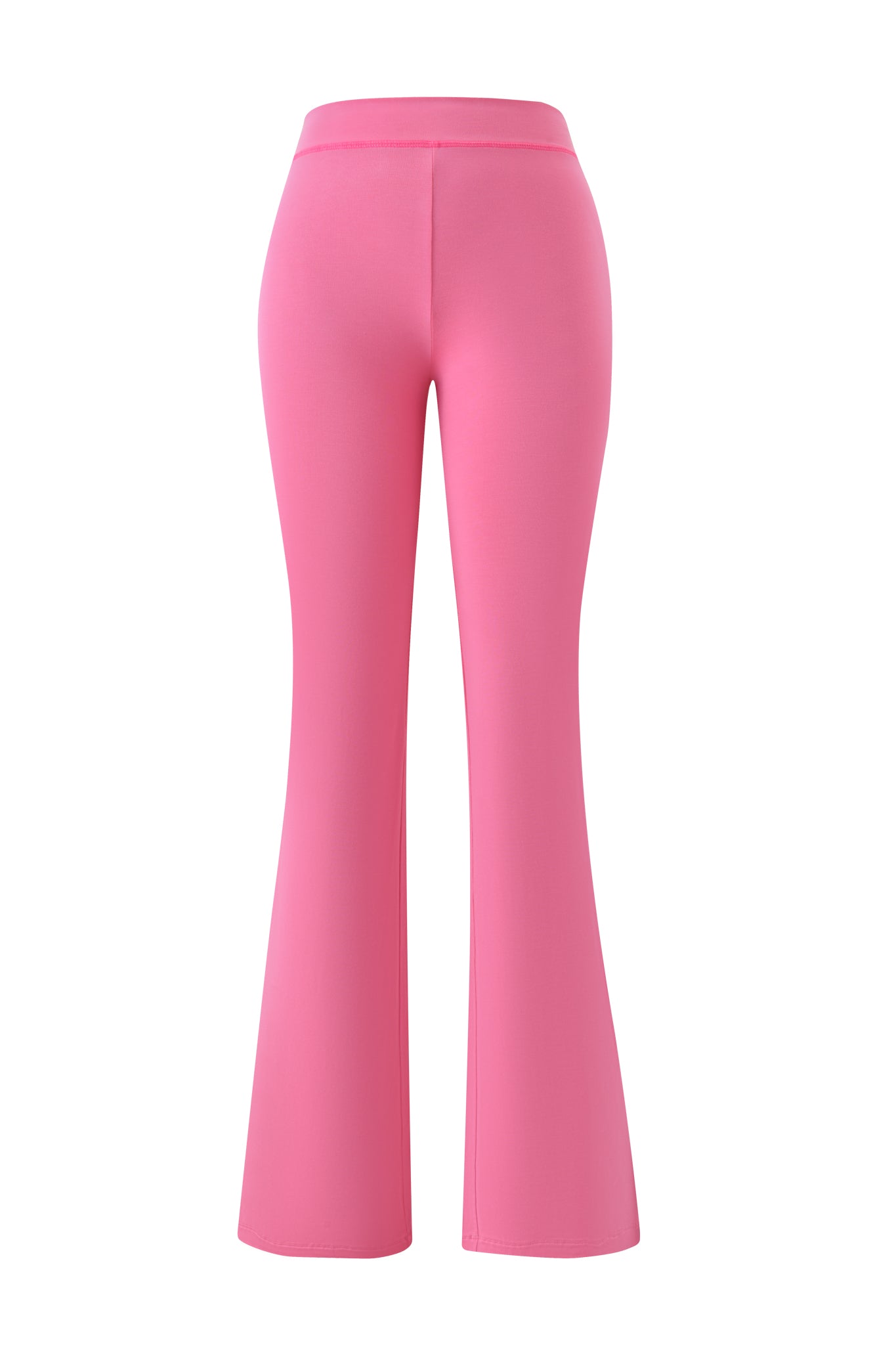 The I.AM.GIA BLARE TRACKPANT in neon pink features a high-waisted, flared silhouette with smooth, stretchy fabric. Fitted at the waist and hips, it flares below the knees for a bold look. Shown from the back on a white background.