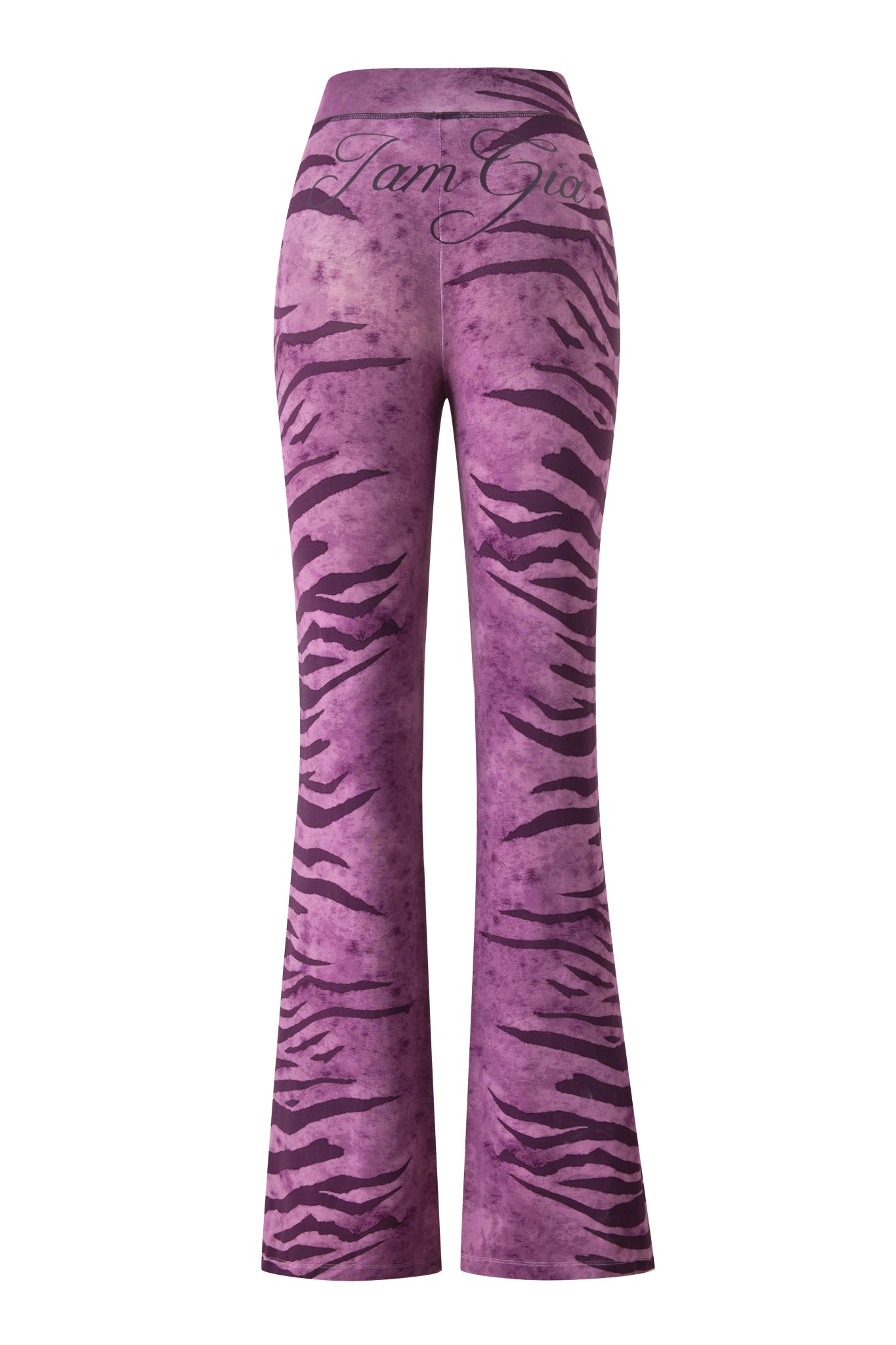 The BLARE TRACKPANT - PLUM WILD SIDE by I.AM.GIA features a purple high-waisted fit, flared leg, bold tiger stripe print, and "I.AM.GIA" scripted on the waistband.