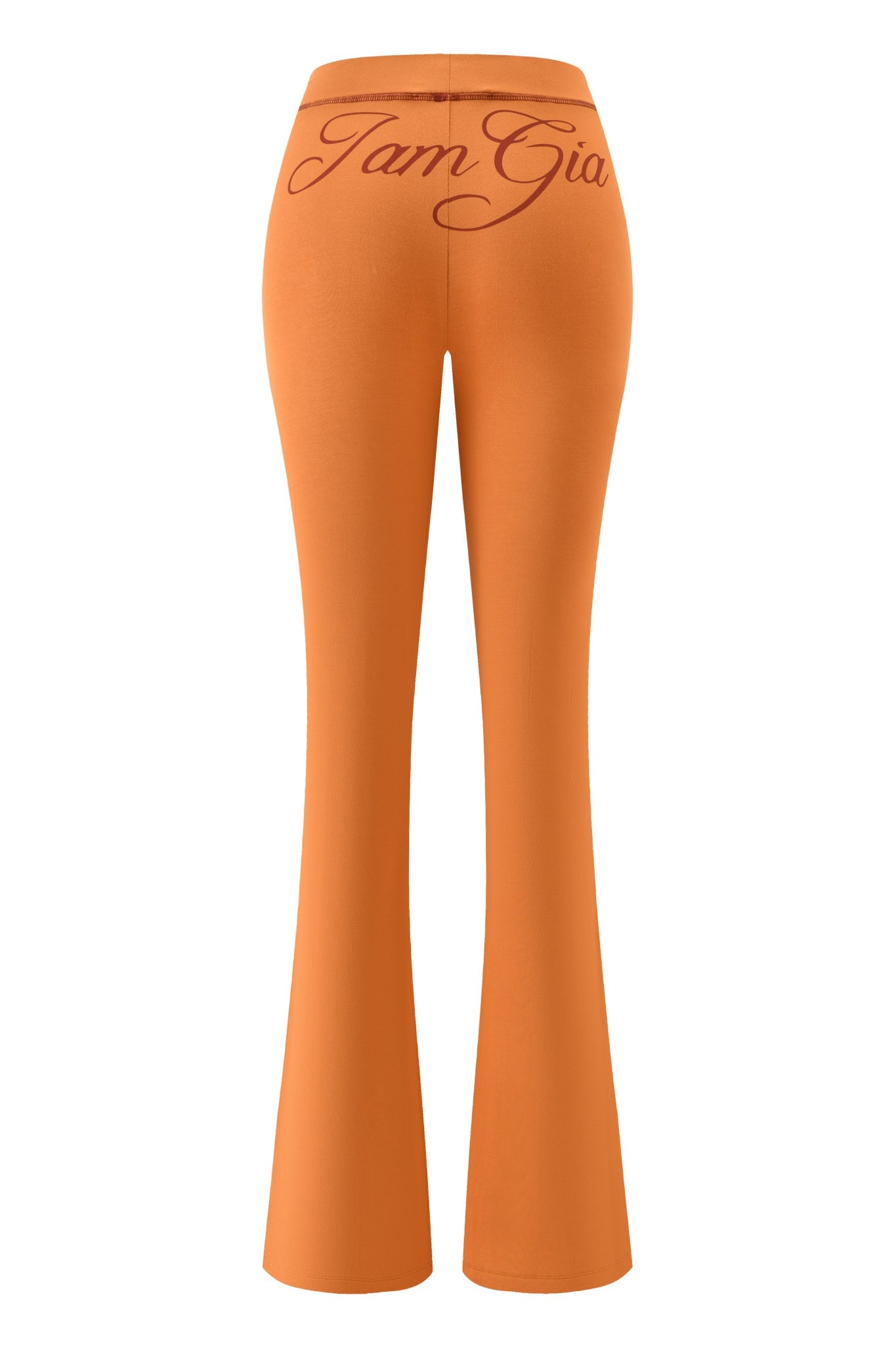 Back view of the BLARE TRACKPANT - PUMPKIN by I.AM.GIA, featuring a low-rise waist and "I.AM.GIA" in cursive across the waistband.