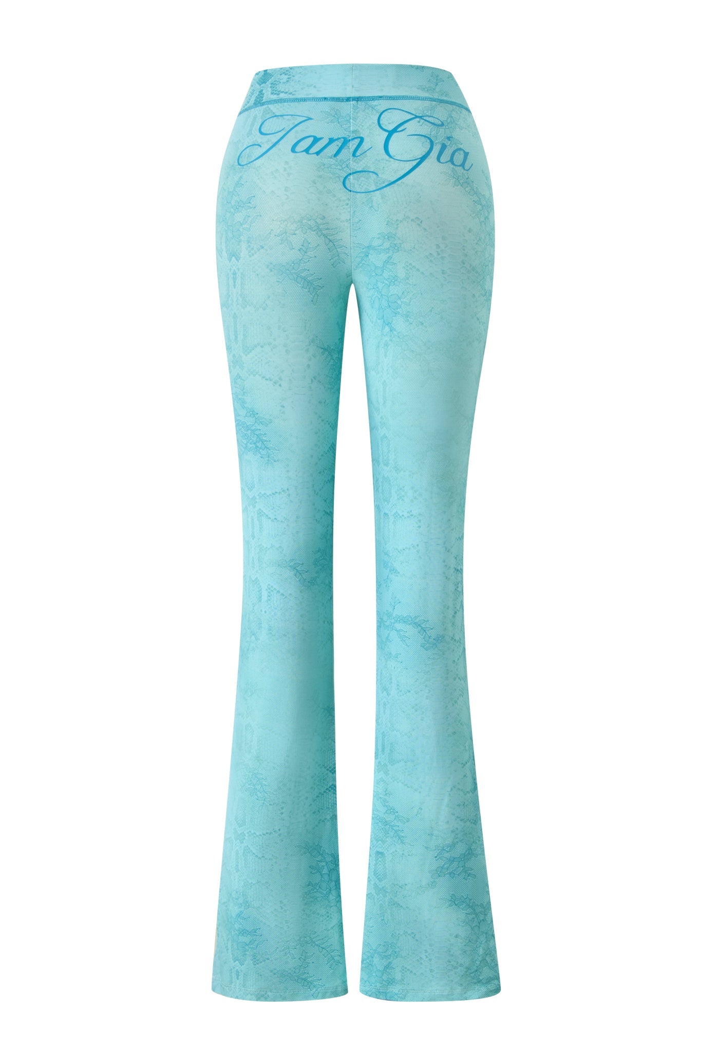The BLARE TRACKPANT - TEAL SERPENTINE by I.AM.GIA features a high waist, flared leg, subtle textured pattern, and “I am Gia” scripted across the back waistband.