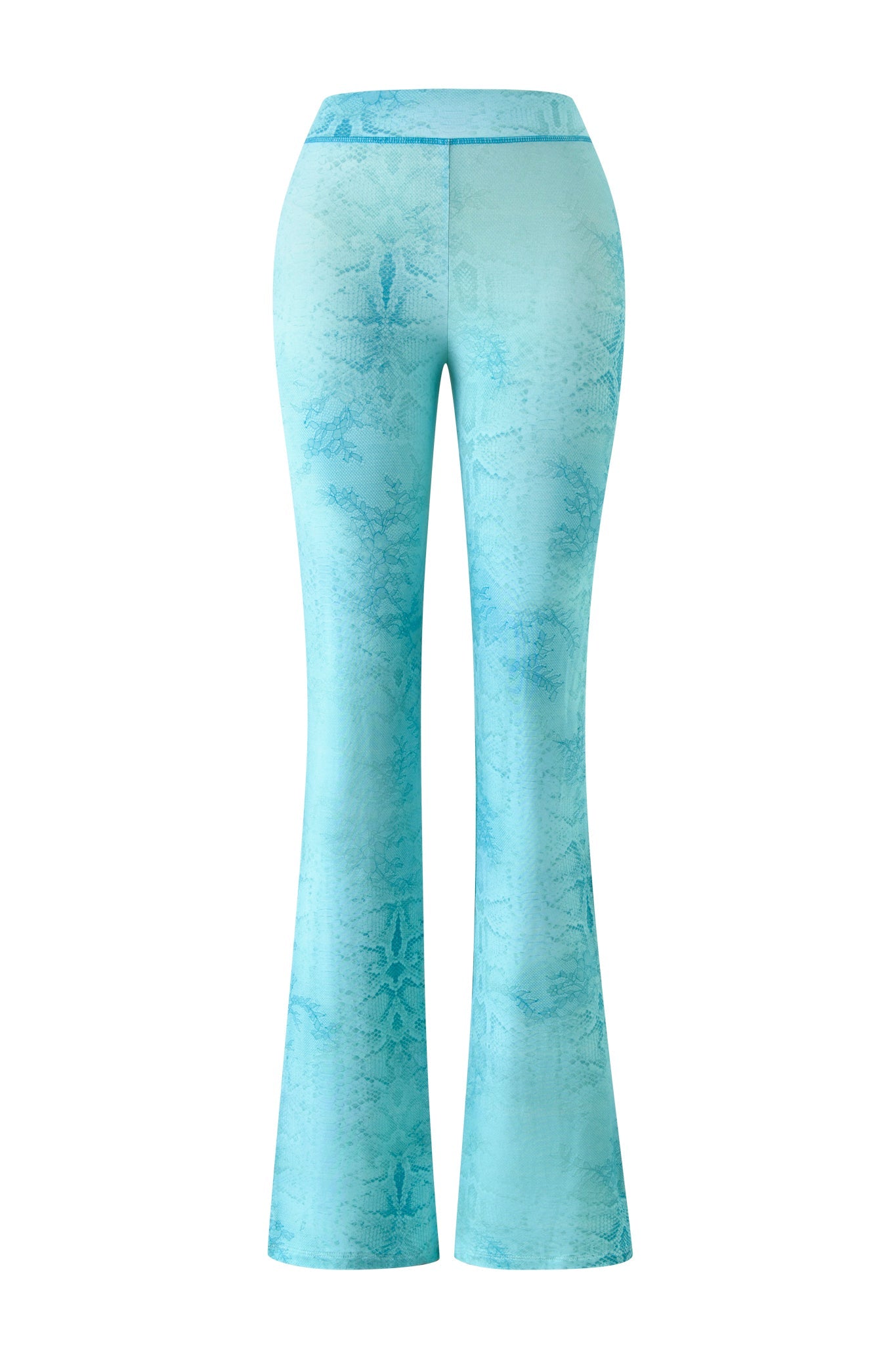 The I.AM.GIA BLARE TRACKPANT - TEAL SERPENTINE showcases a high-waisted, flared silhouette with a subtle snake print, displayed from the back on a white background.