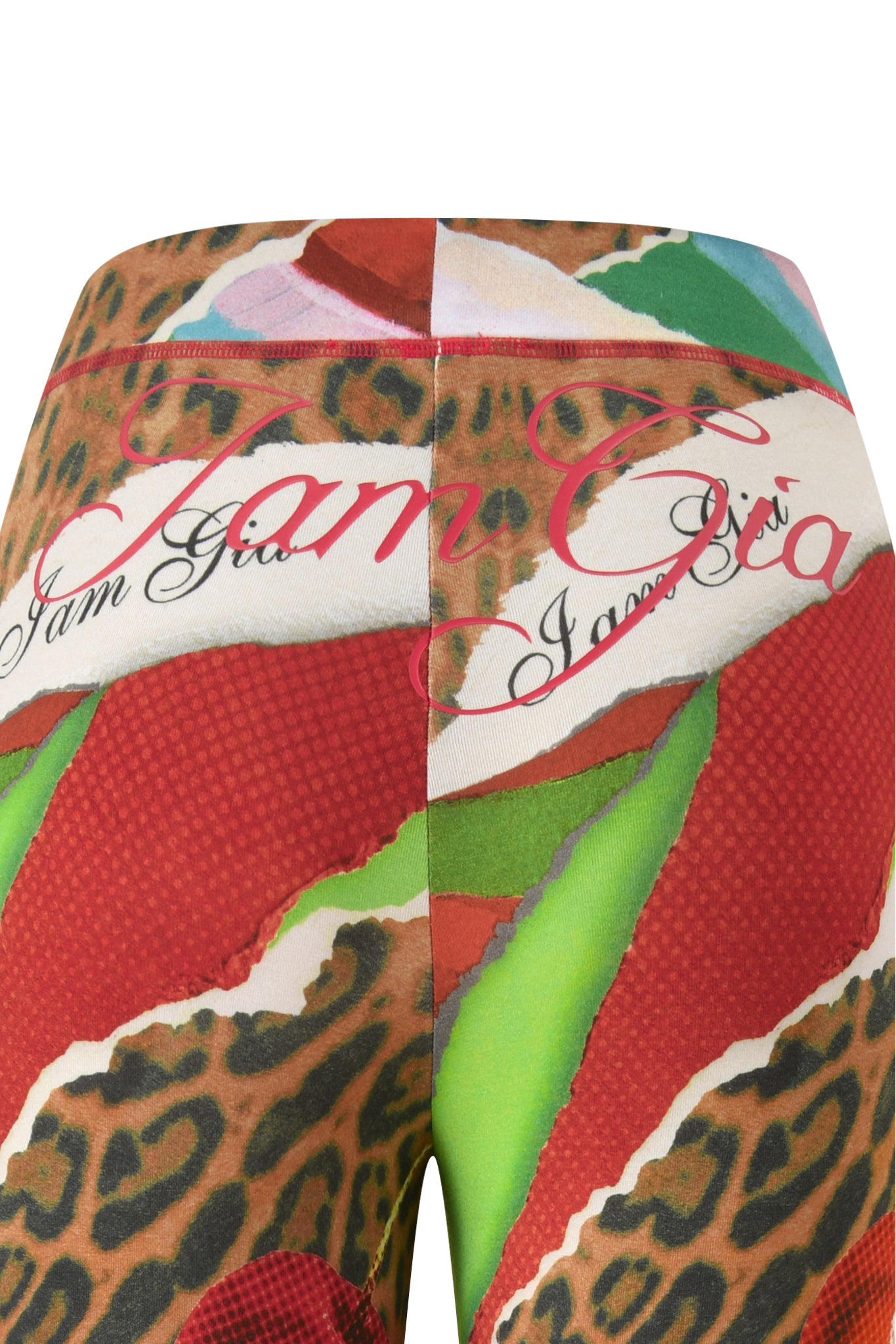 Close-up of BLARE TRACKPANT - WILD CHERRY by I.AM.GIA, featuring colorful red and green prints, cursive "Jam Gia" text, and soft bamboo fabric.