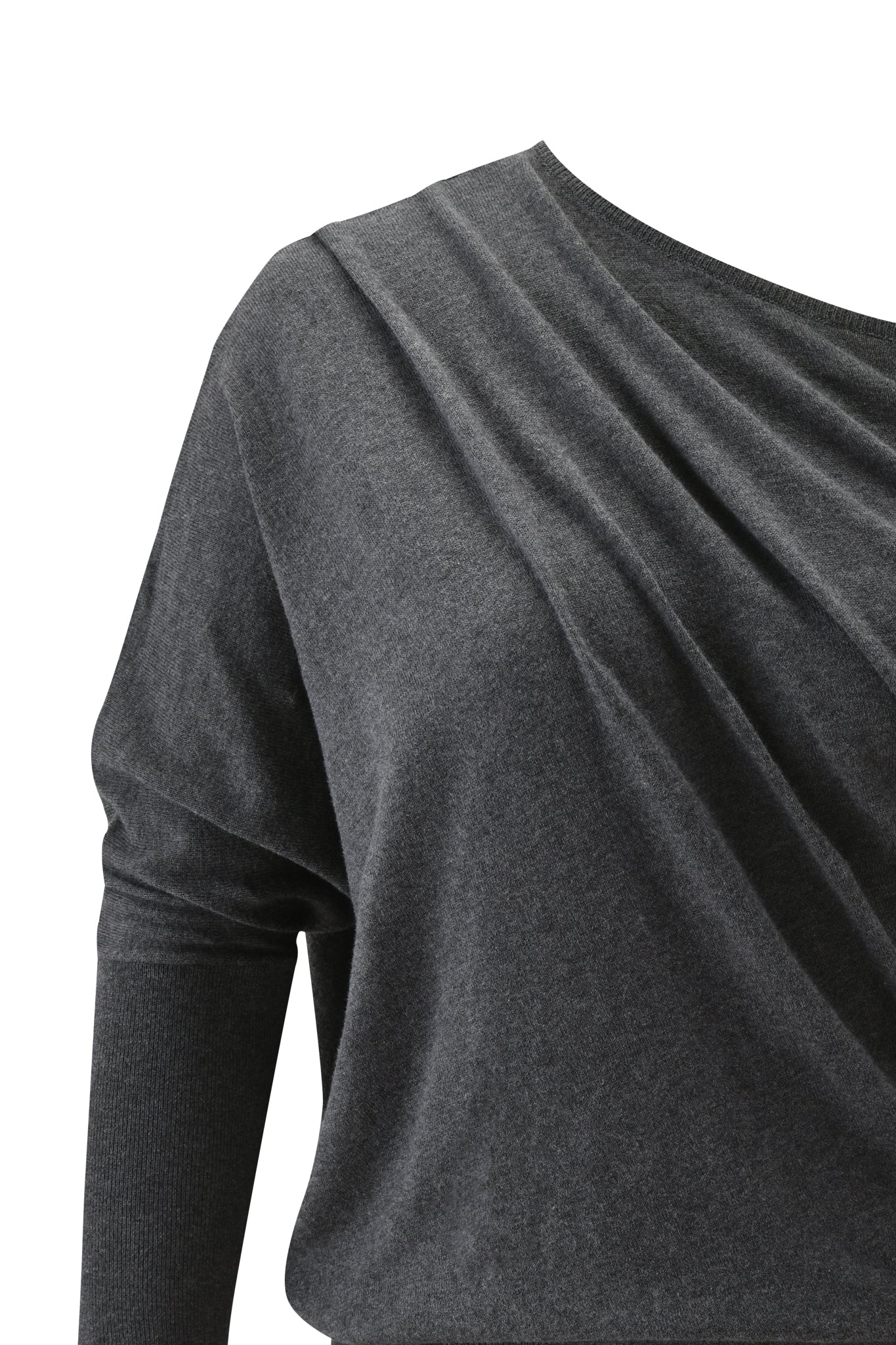 A close-up of the GISELLE TOP - CHARCOAL GREY by I.AM.GIA, featuring long sleeves, an asymmetrical neckline, and draped knit fabric with chest gathering, displayed against a white background.